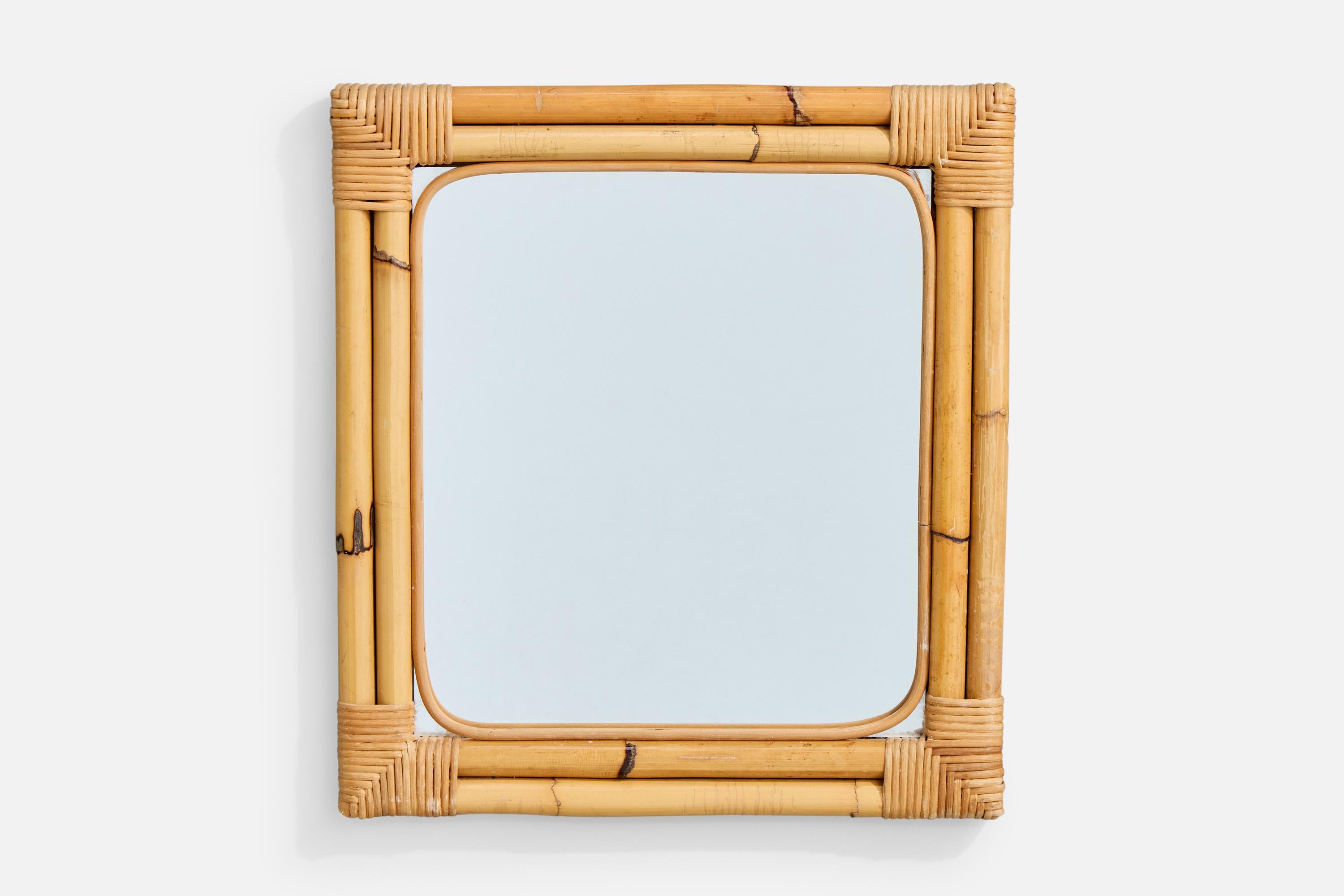 A bamboo and rattan wall mirror designed and produced in Italy, c. 1960s.

Overall Dimensions (inches): 20.5