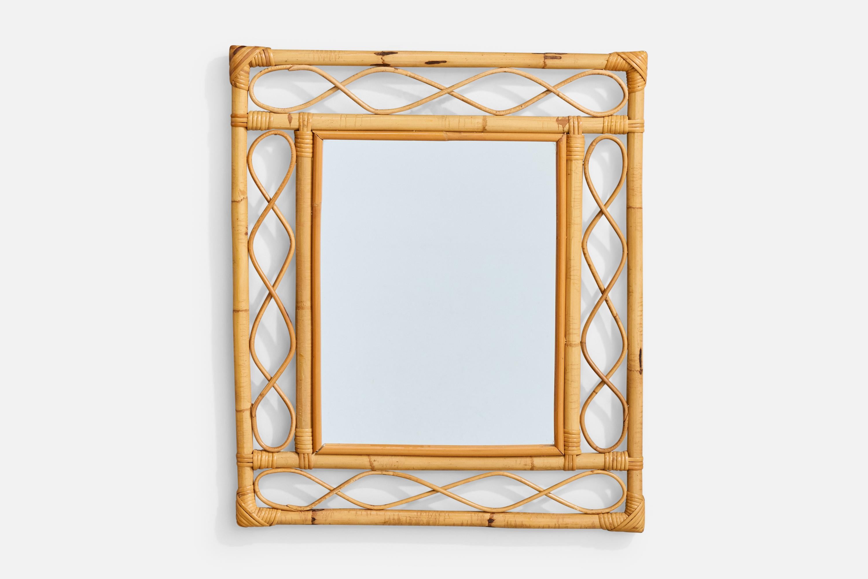 Espejo de pared de bambú y ratán diseñado y fabricado en Italia, c. 1960.

Dimensiones totales (pulgadas): 24,0 