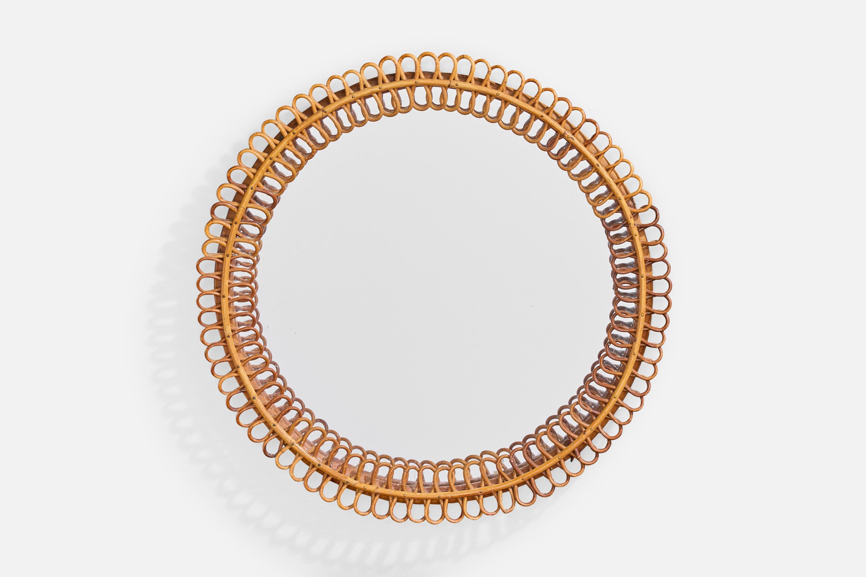 Miroir mural en bambou et rotin, conçu et produit en Italie, C.C., années 1960.

Dimensions globales (pouces) : 25.25 