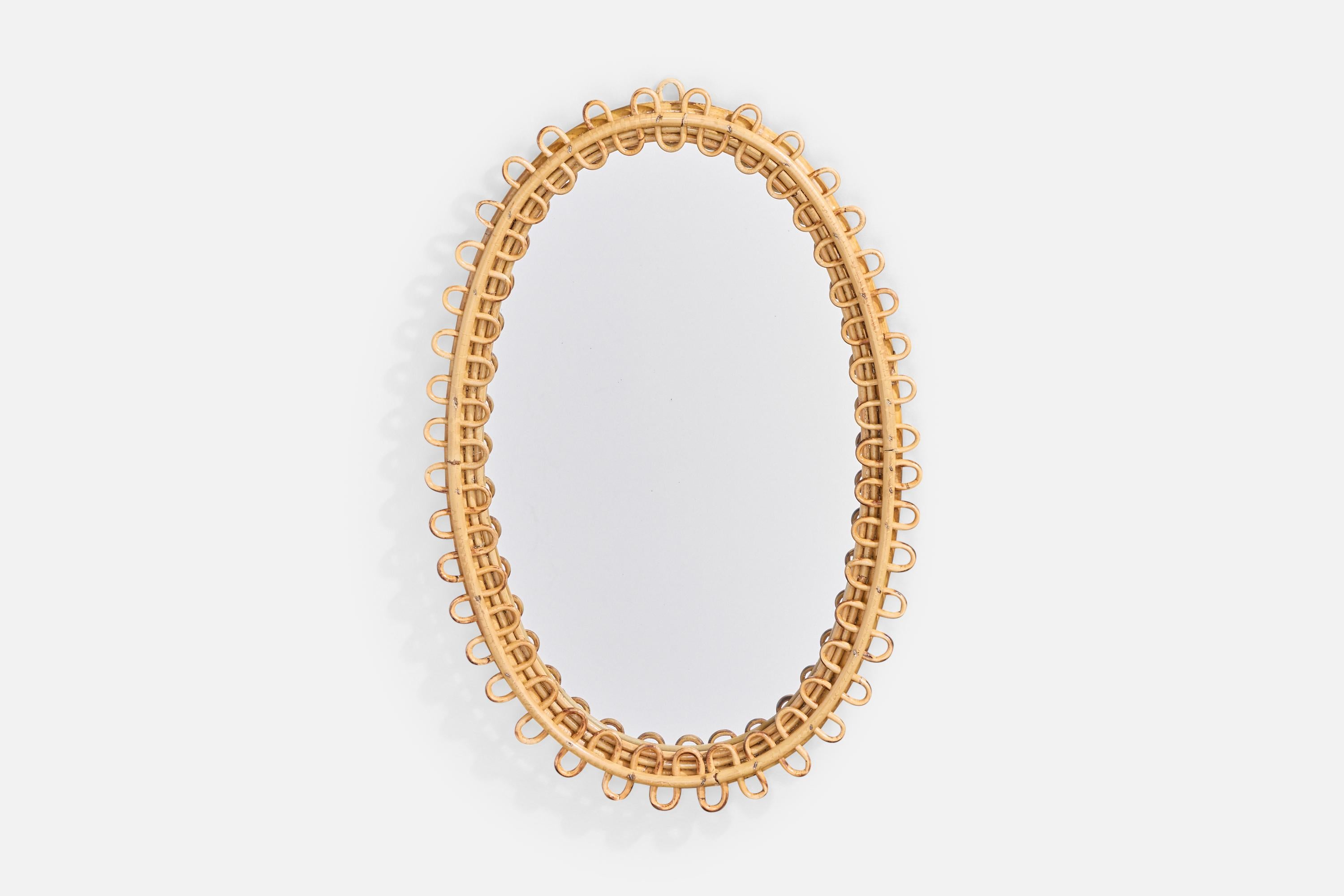A bamboo and rattan wall mirror designed and produced in Italy, c. 1960s.

Overall Dimensions (inches): 25.0
