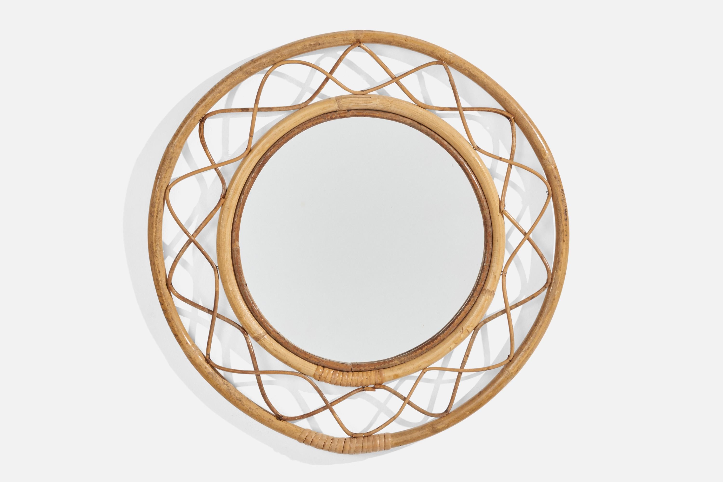 A bamboo and rattan wall mirror produced and designed in Italy, 1960s.