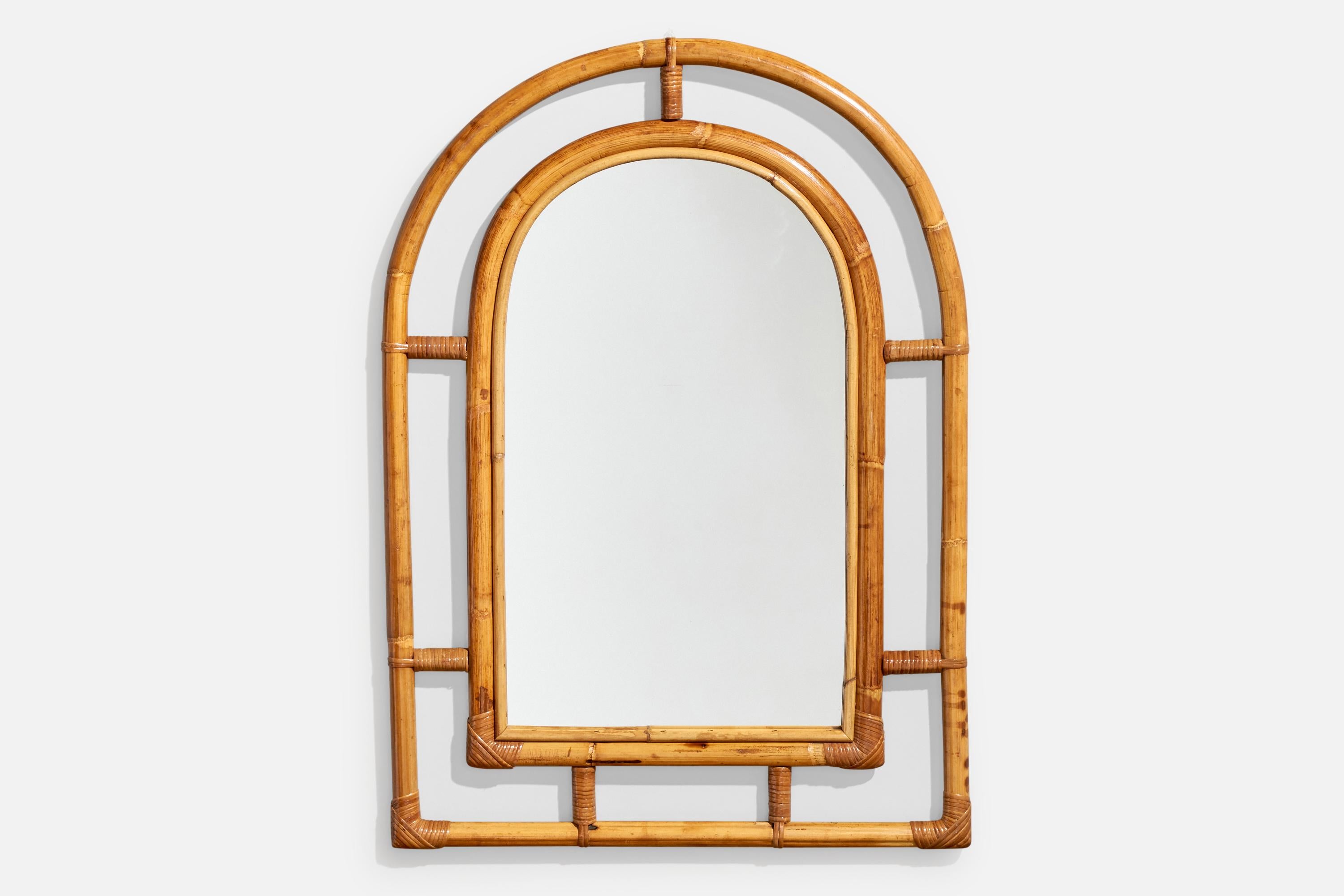 A bamboo and rattan wall mirror produced and designed in Italy, 1960s.