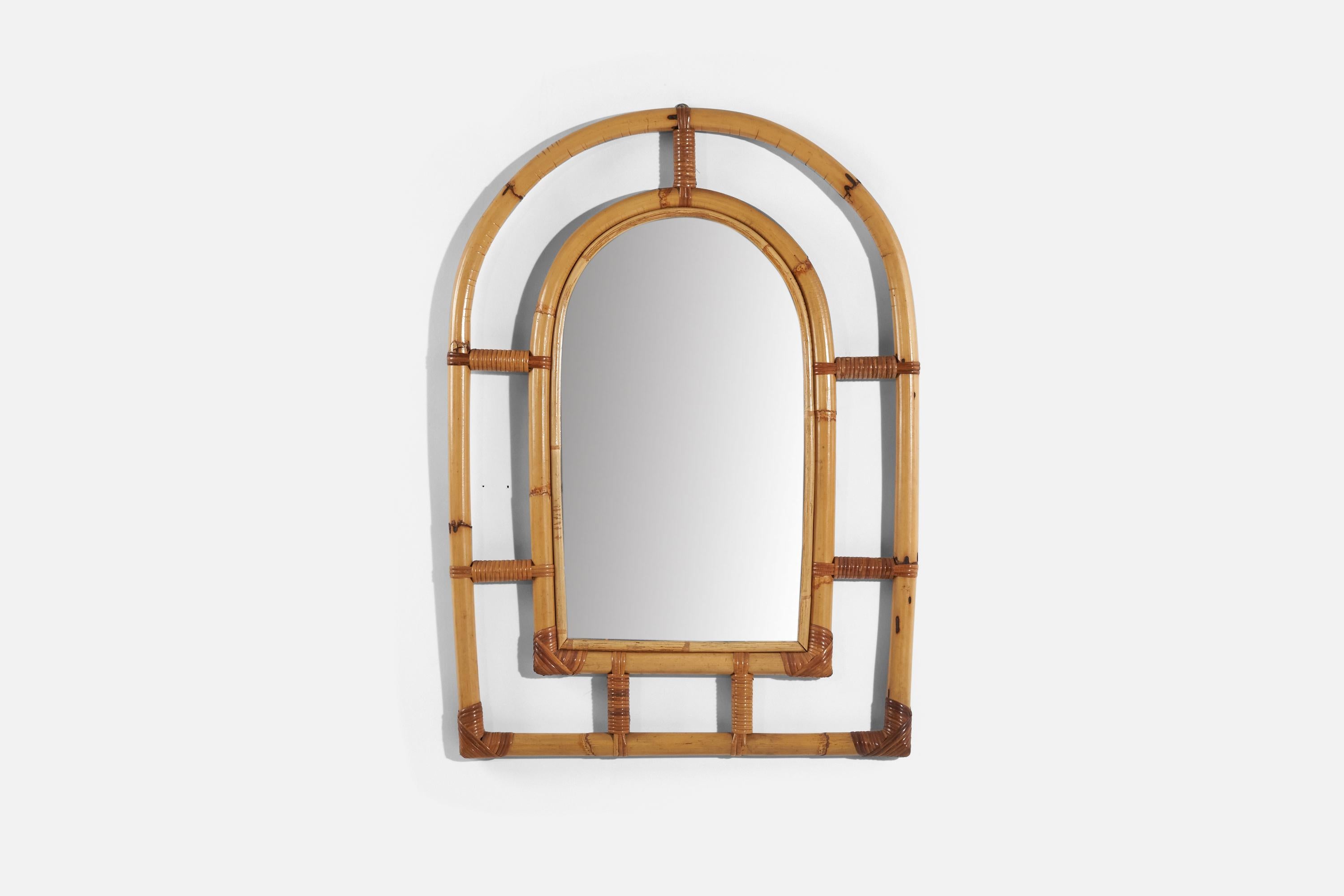 A bamboo and rattan wall mirror designed and produced by an Italian designer, Italy, 1950s-1960s.
   
