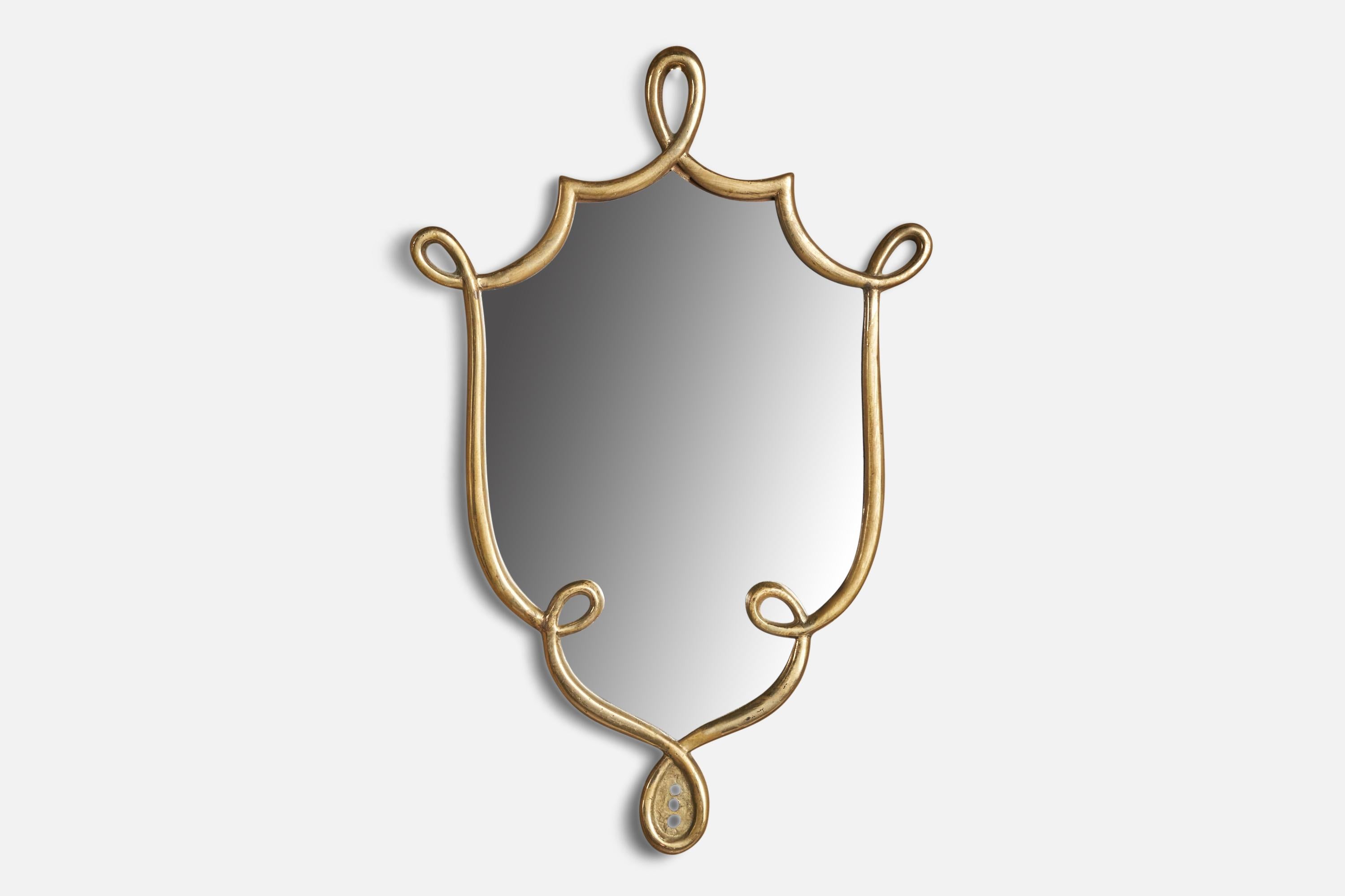 A brass wall mirror designed and produced in Italy, 1930s.