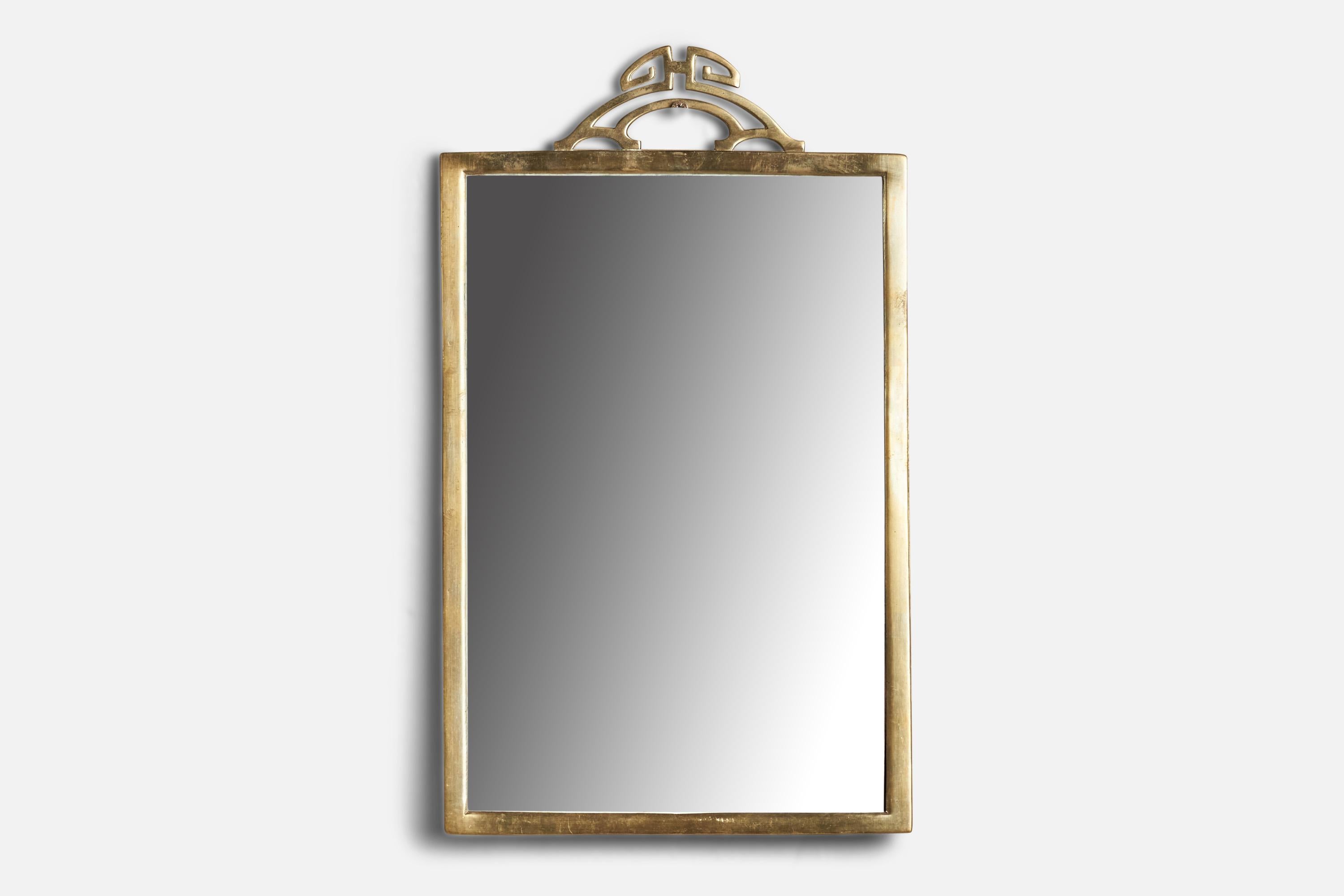 A brass wall mirror designed and produced in Italy, c. 1930s.