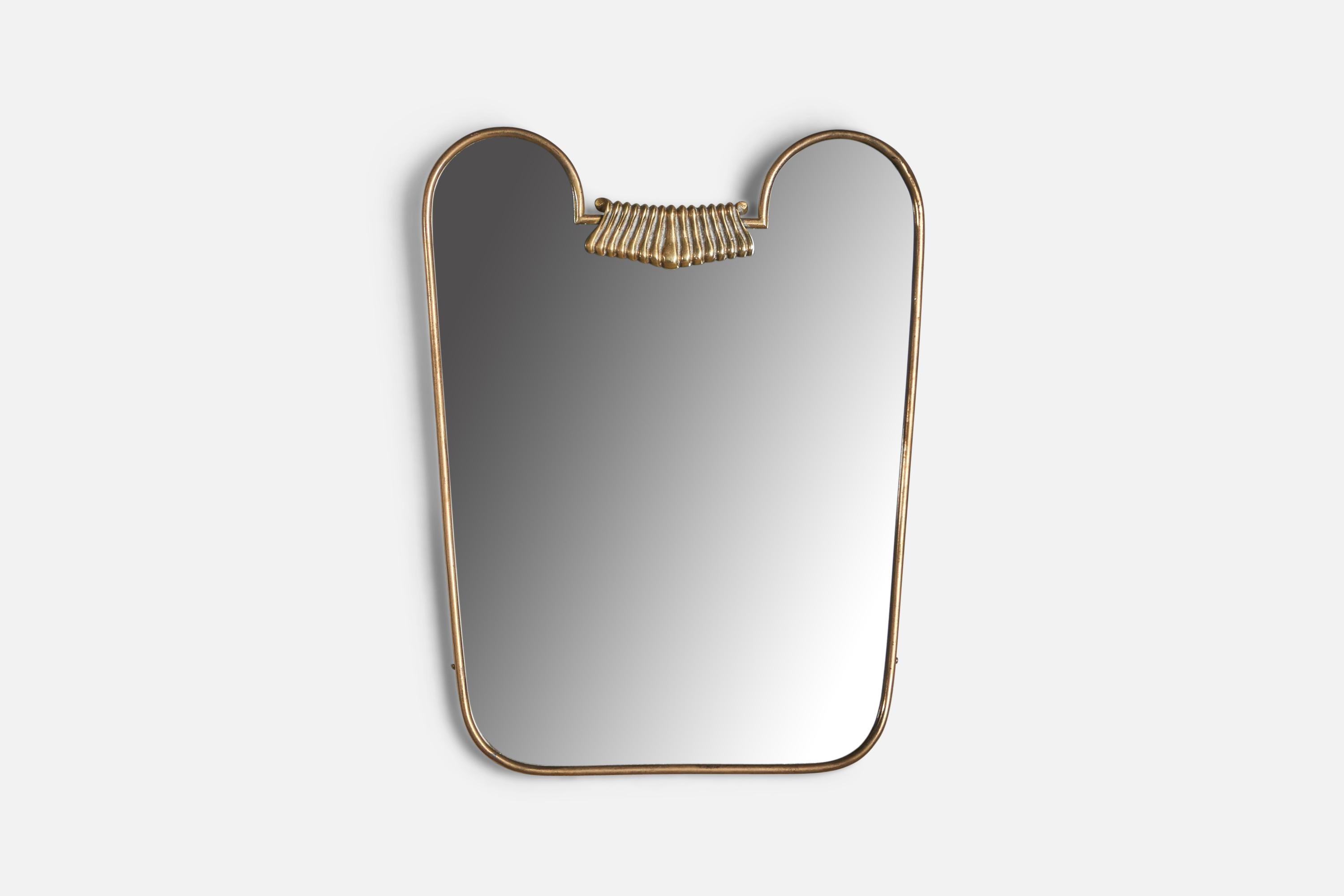 A brass wall mirror, designed and produced in Italy, 1940s.