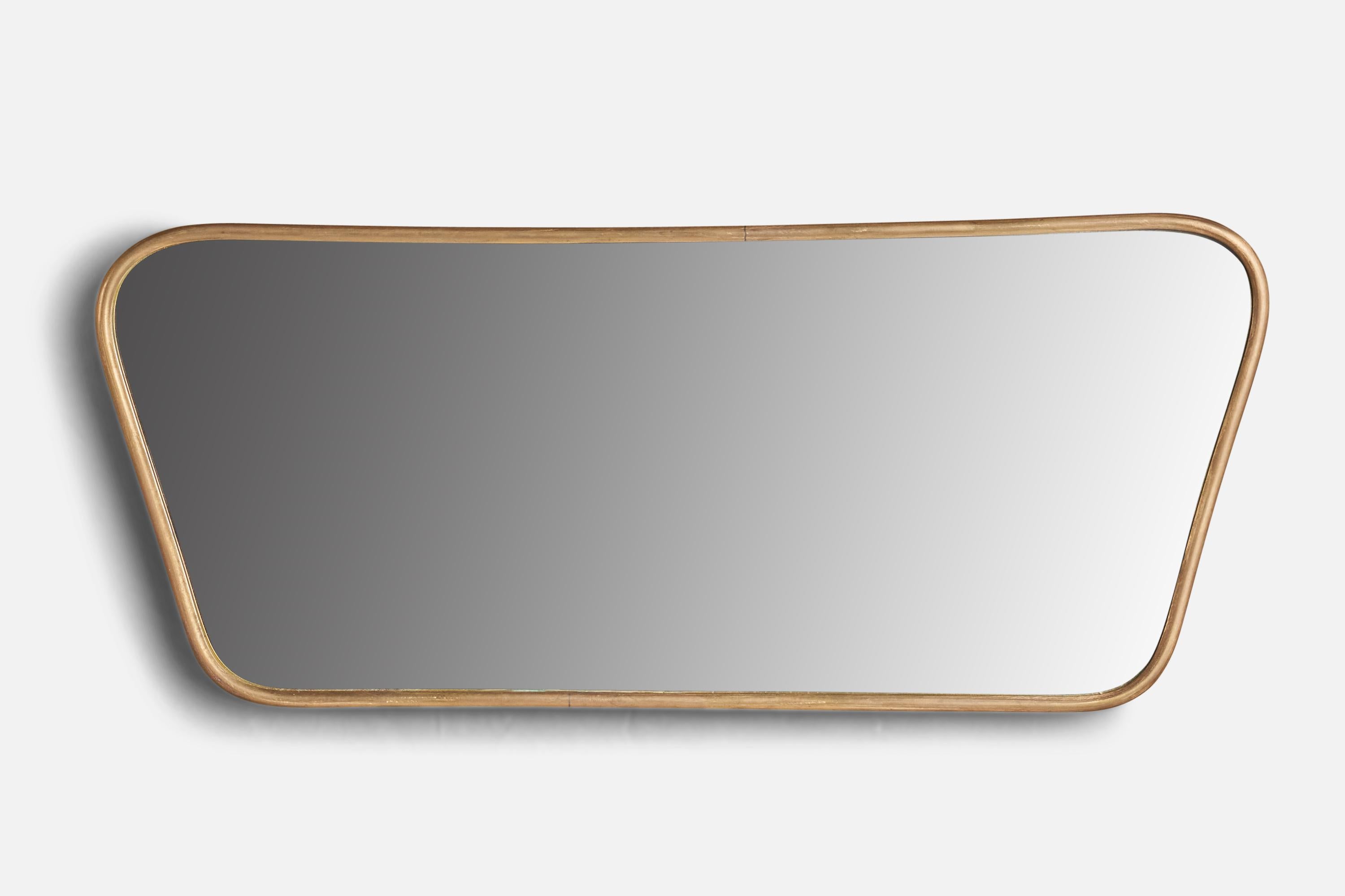 A brass wall mirror designed and produced in Italy, 1940s.