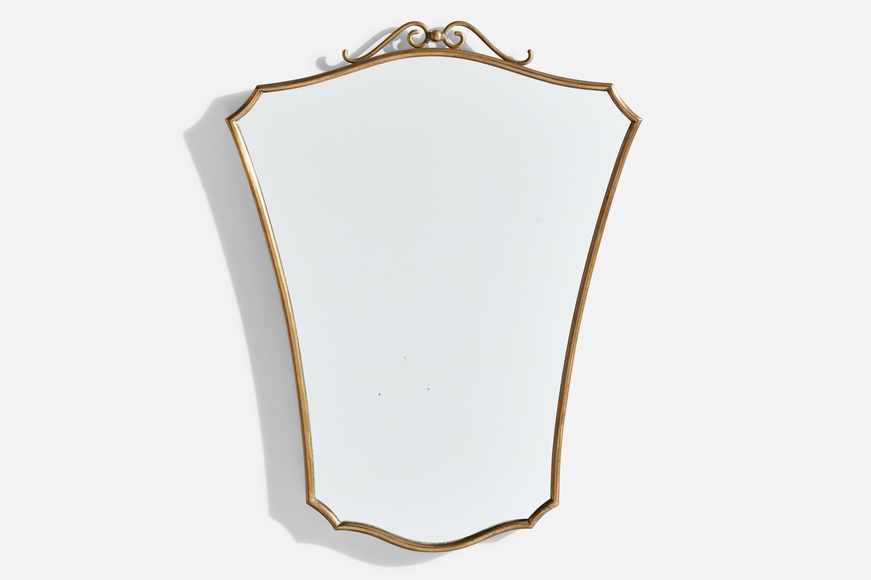 A brass wall mirror designed and produced in Italy, c. 1940s.