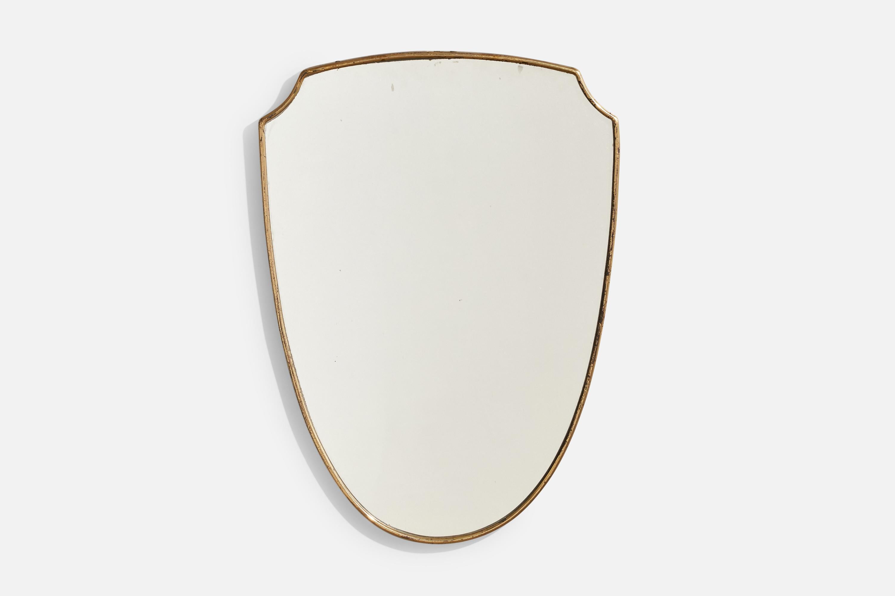 Espejo de pared de latón diseñado y fabricado en Italia, c. 1940.

Dimensiones: 22,75