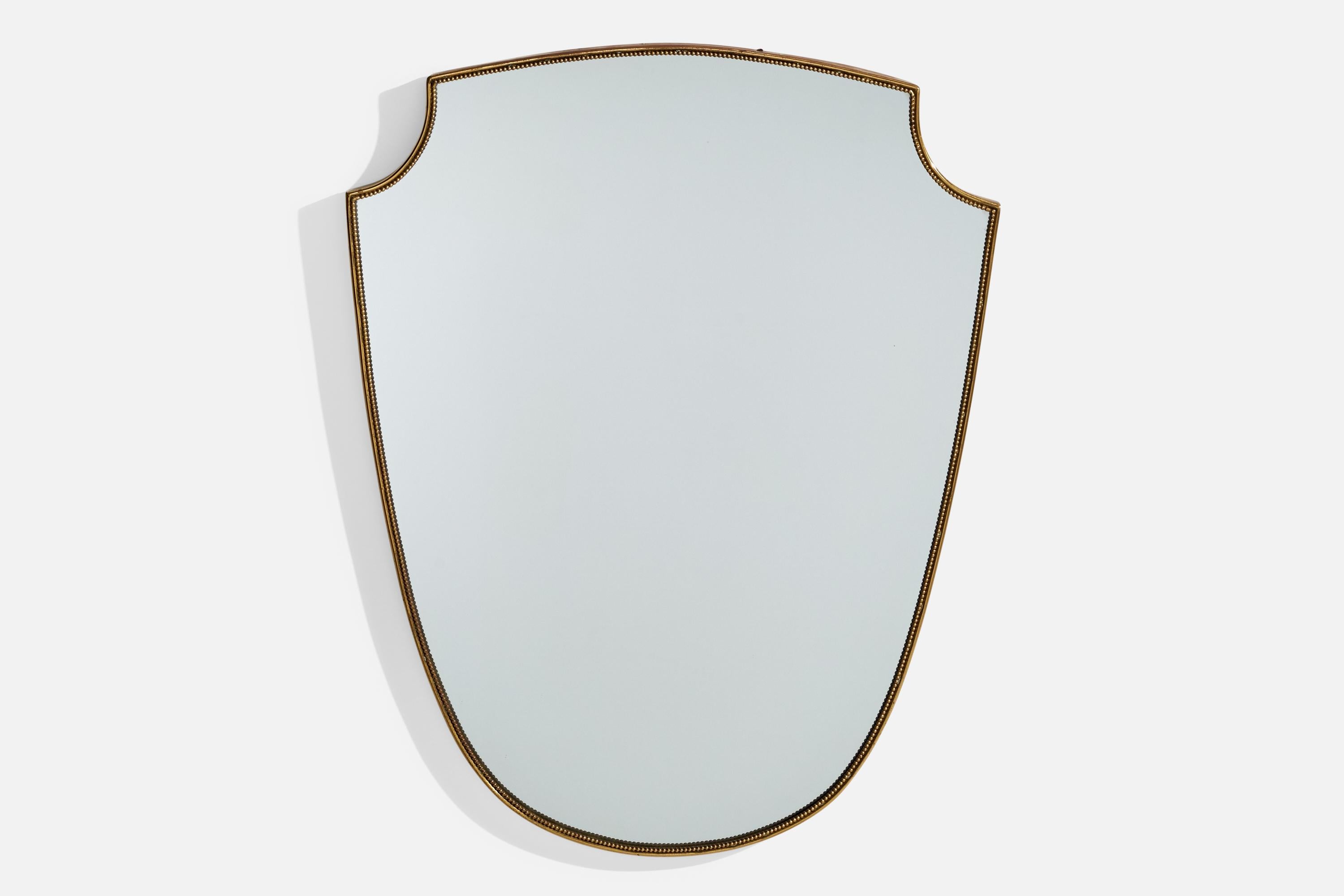 A brass wall mirror designed and produced in Italy, c. 1950s.

Overall Dimensions (inches): 28.375