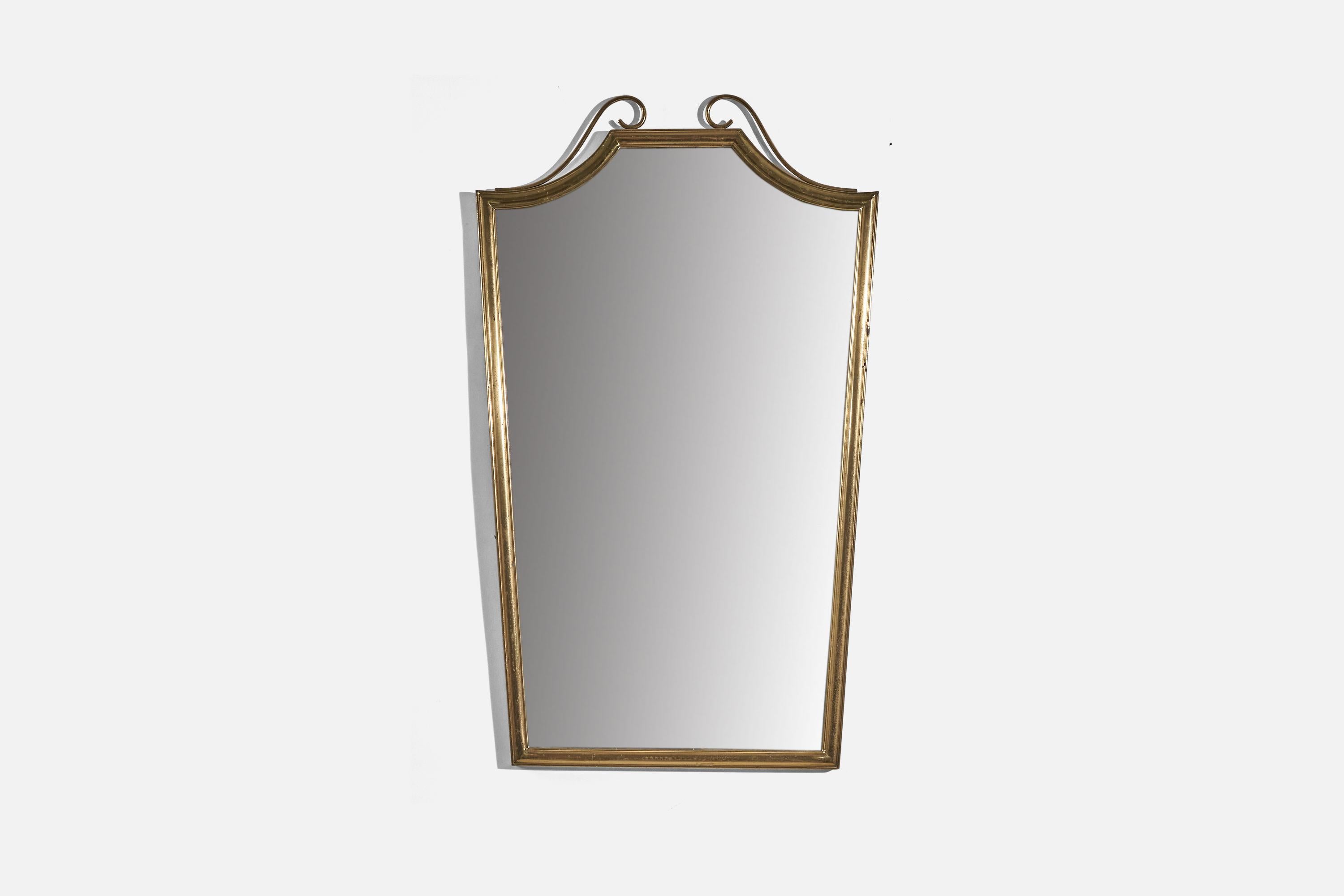 A brass wall mirror designed and produced in Italy, c. 1940s.
   