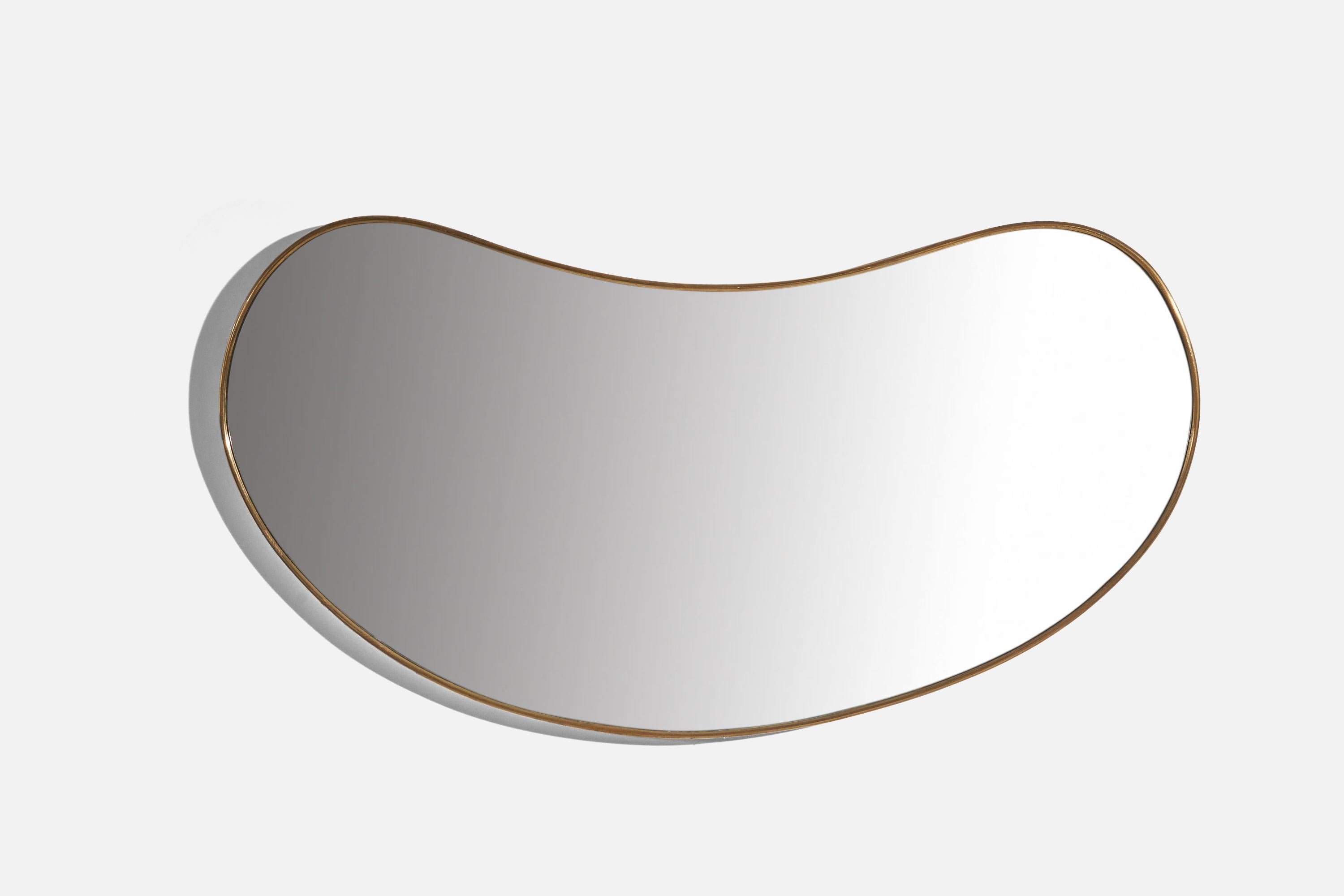 A brass wall mirror designed and produced in Italy, c. 1940s.
  