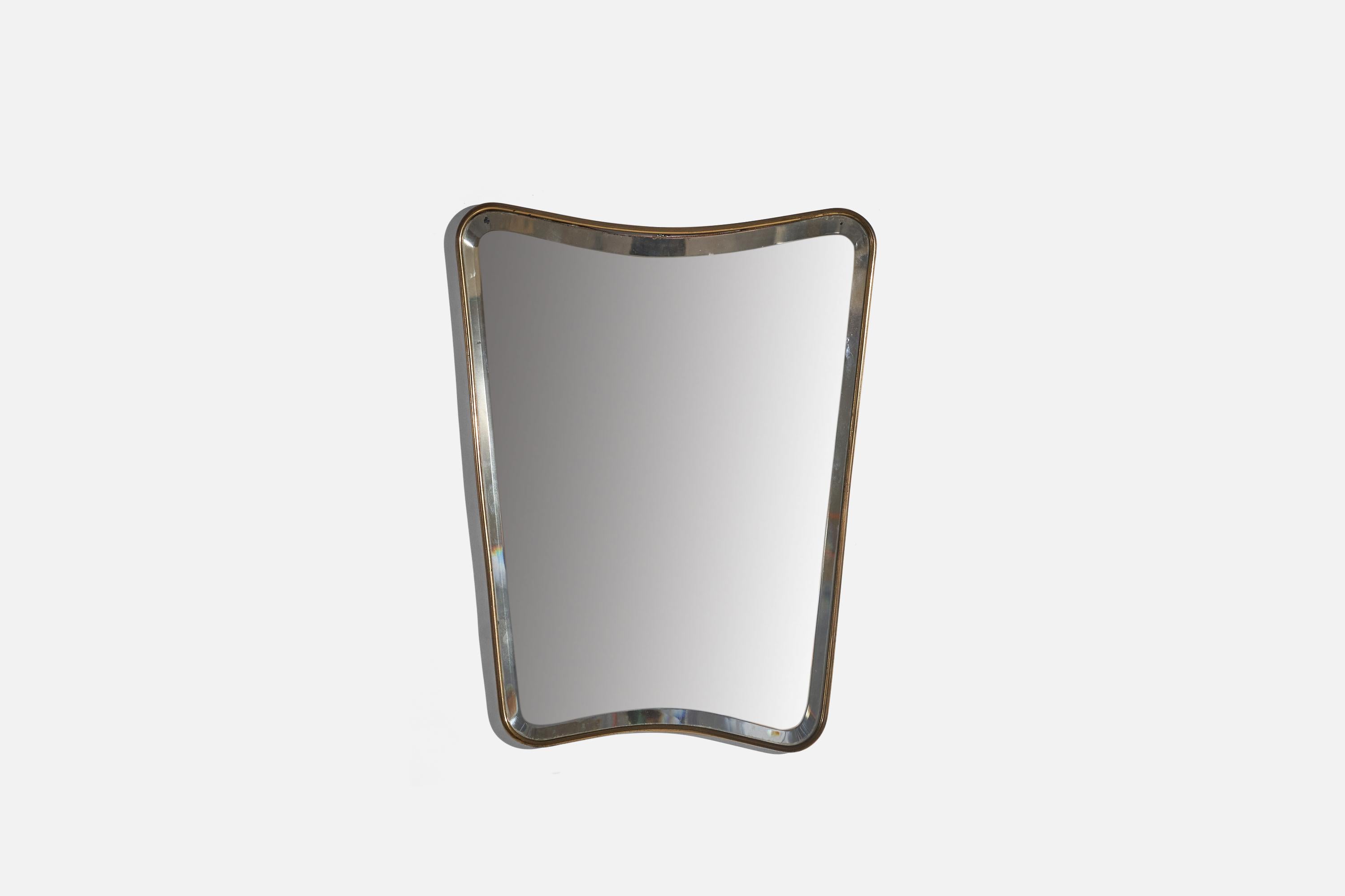 A beveled glass brass wall mirror designed and produced in Italy, c. 1940s.
 