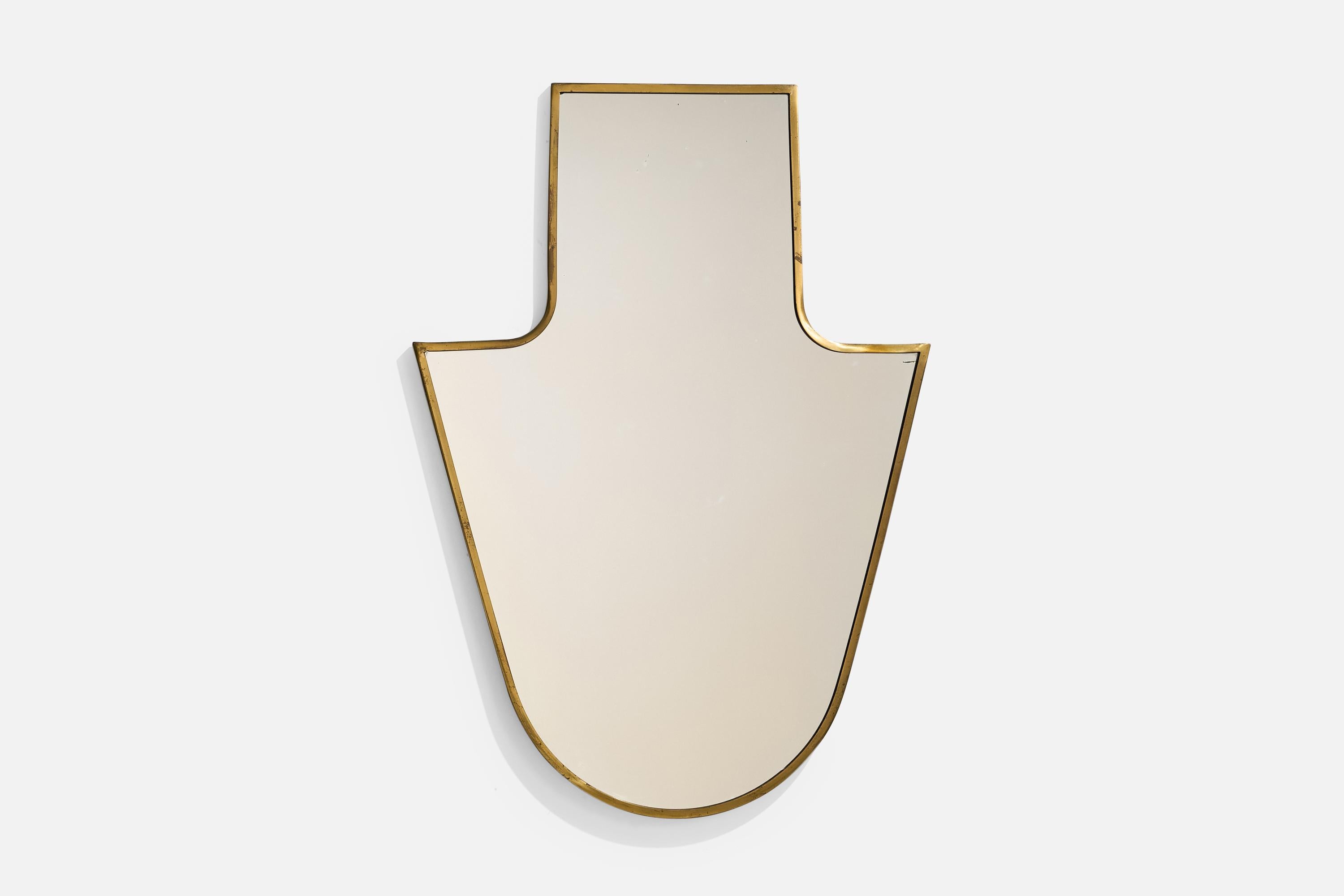 A brass wall mirror designed and produced in Italy, c. 1940s.
 