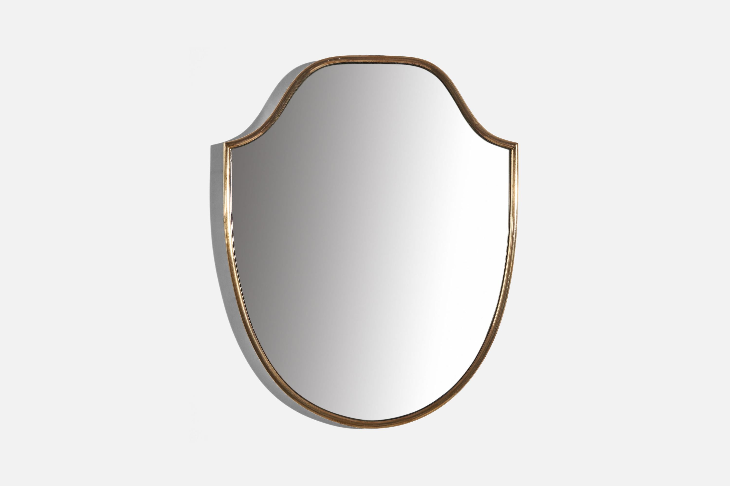 A brass wall mirror designed and produced in Italy, c. 1950s.
   