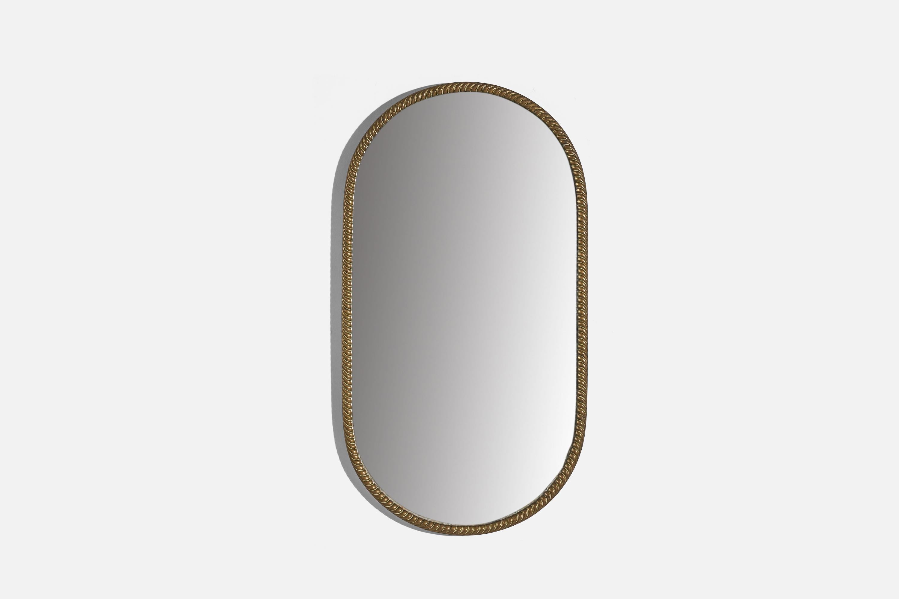 A brass wall mirror designed and produced by an Italian designer, Italy, c. 1940s.
 
