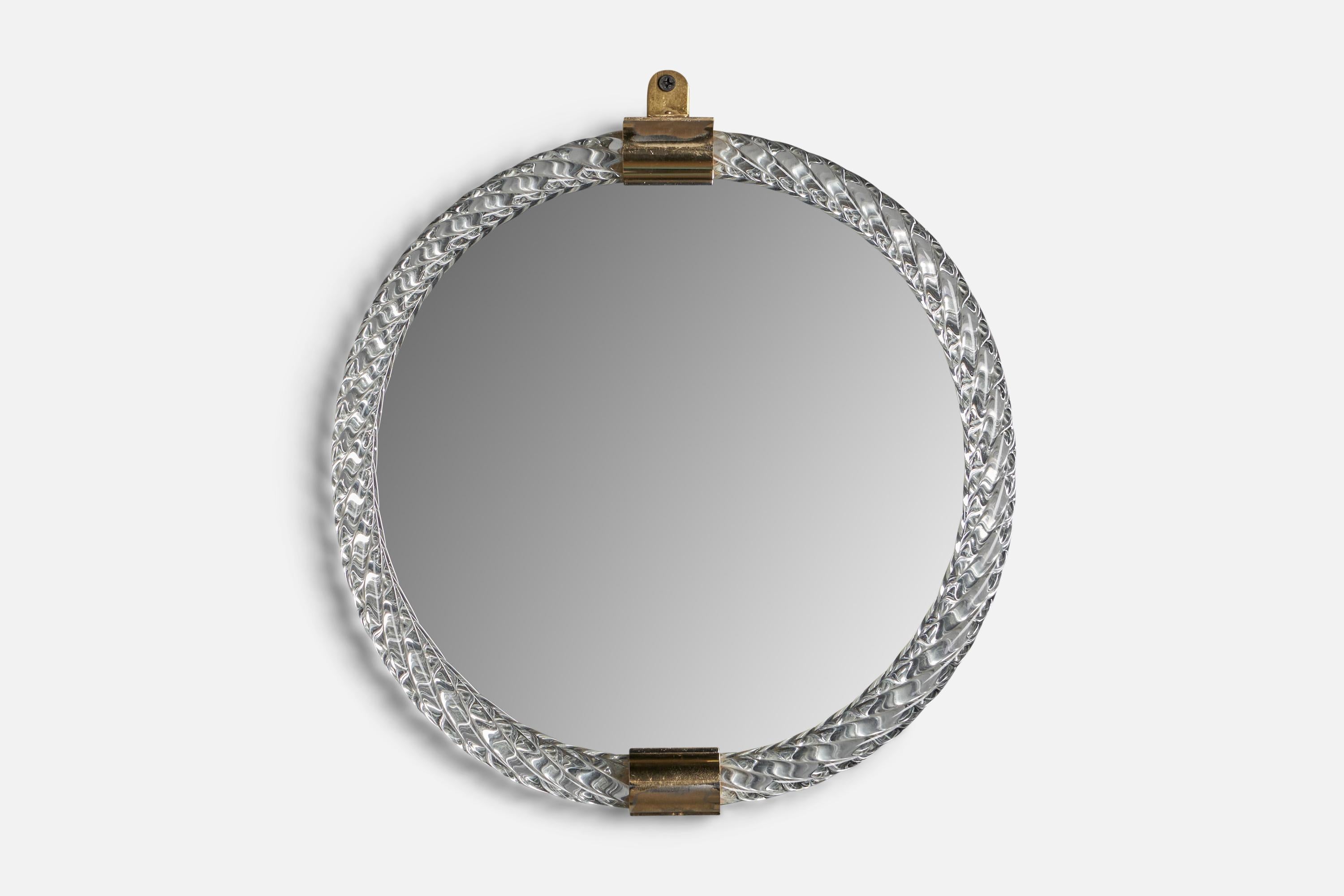 A round Murano glass and brass mirror, designed and produced in Italy c. 1980s.