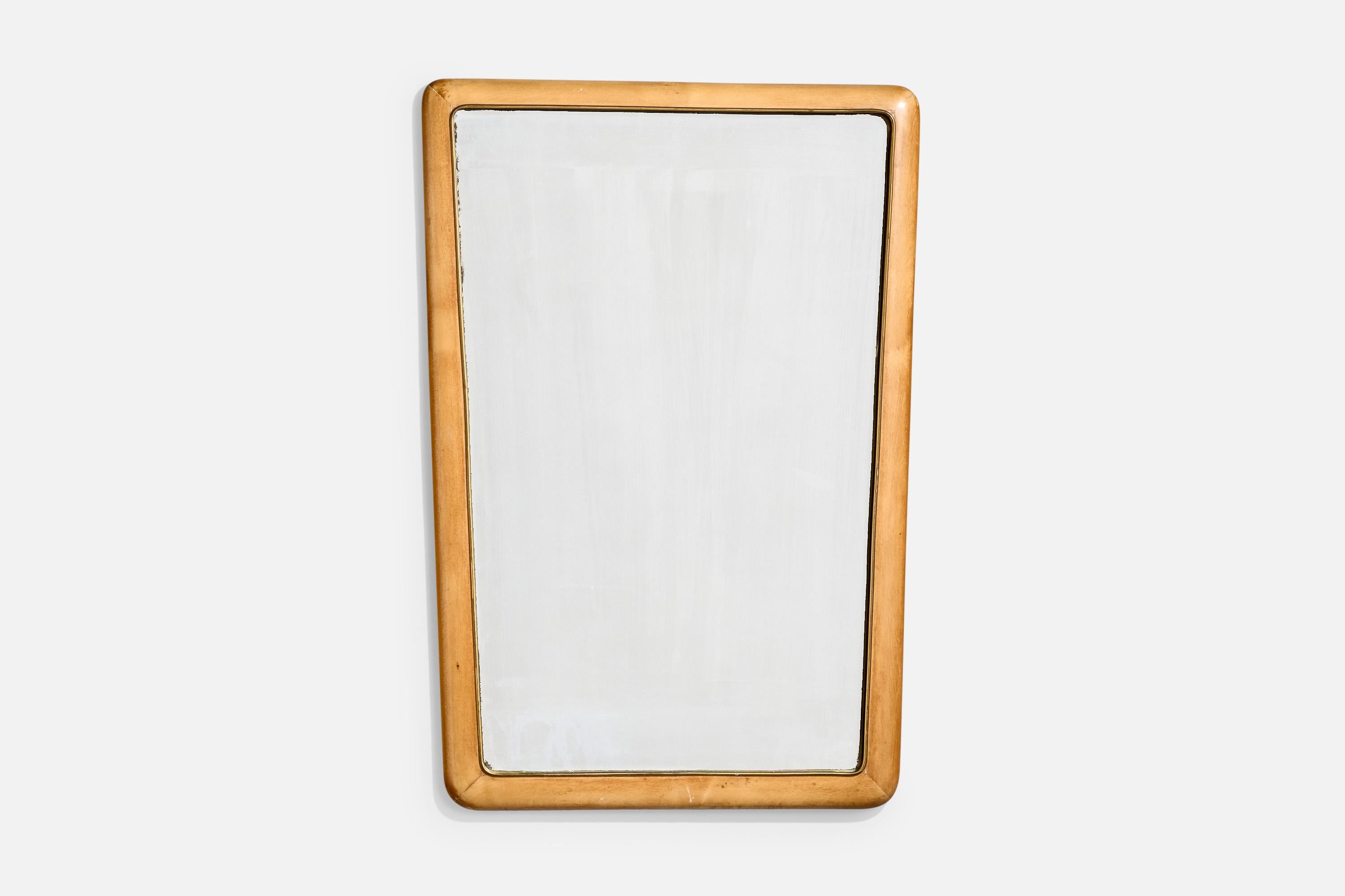 A sizable wood and brass wall mirror designed and produced in Italy, c. 1950s.

Dimensions: 34” H x 23.25” W x 1.75” D