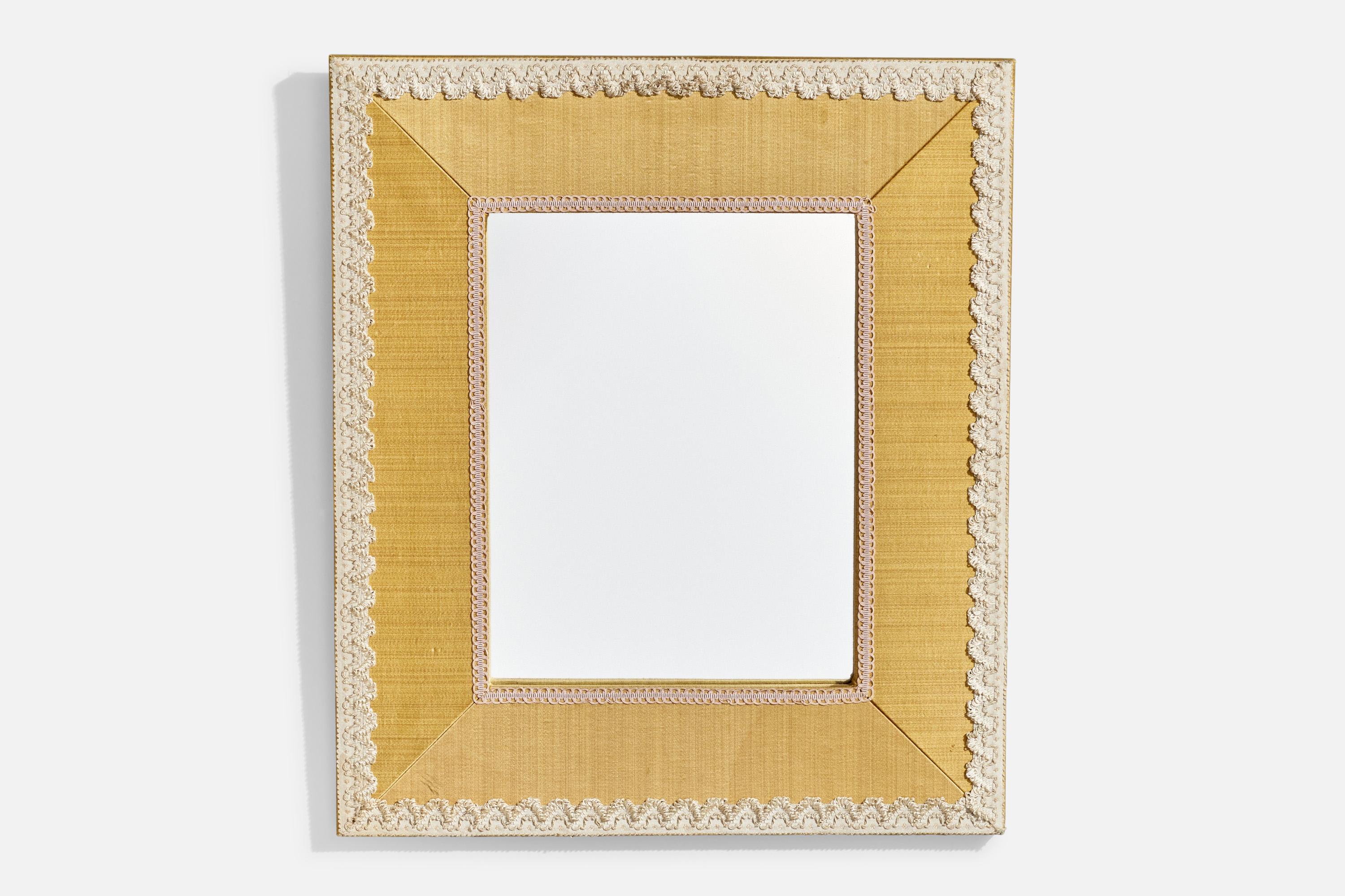 A yellow and off white fabric wall mirror designed and produced in Italy, c. 1940s.

