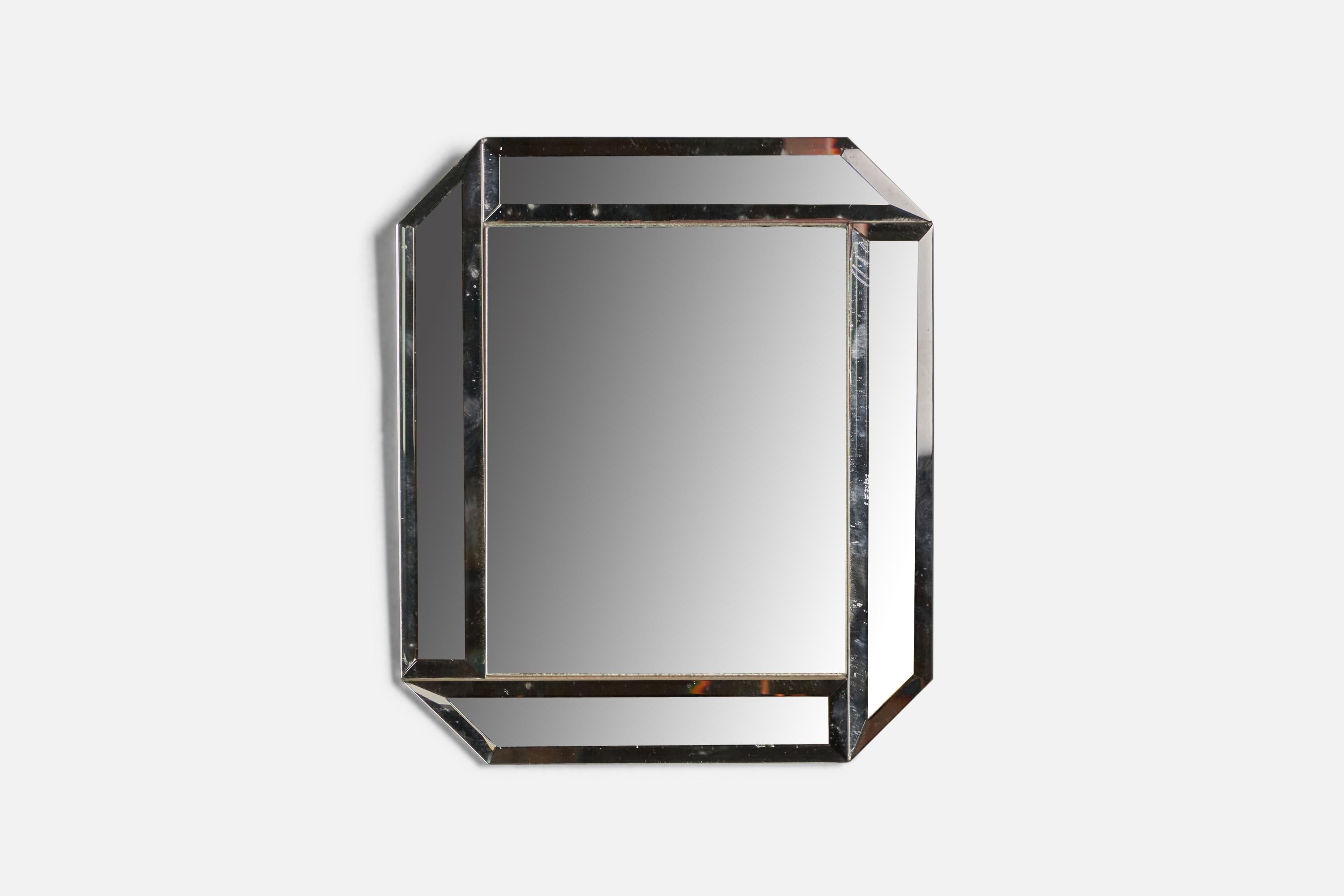 A glass wall mirror designed and produced in Italy, c. 1960s.