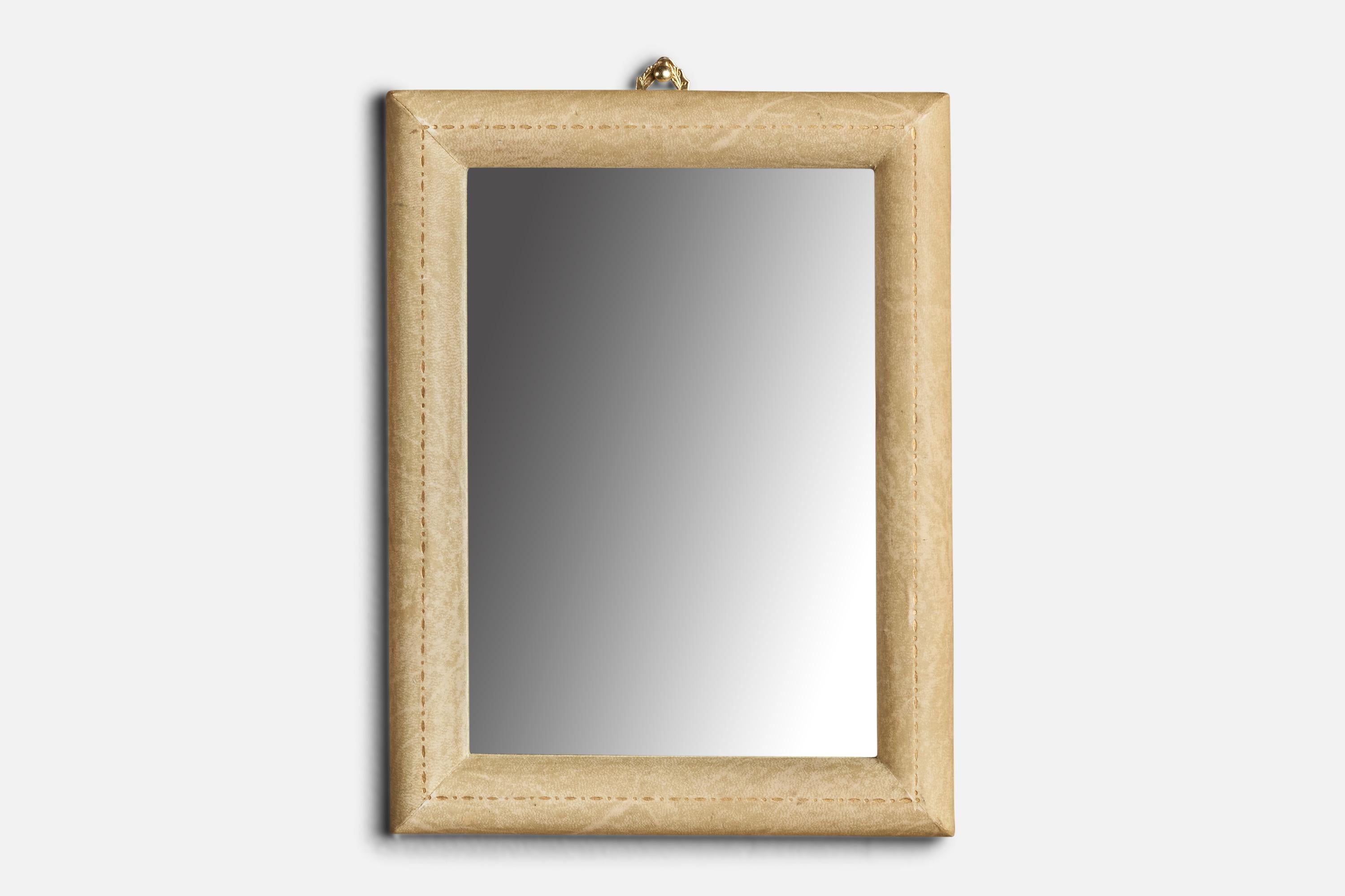 A parchment paper over wood wall mirror designed and produced in Italy, 1940s.
