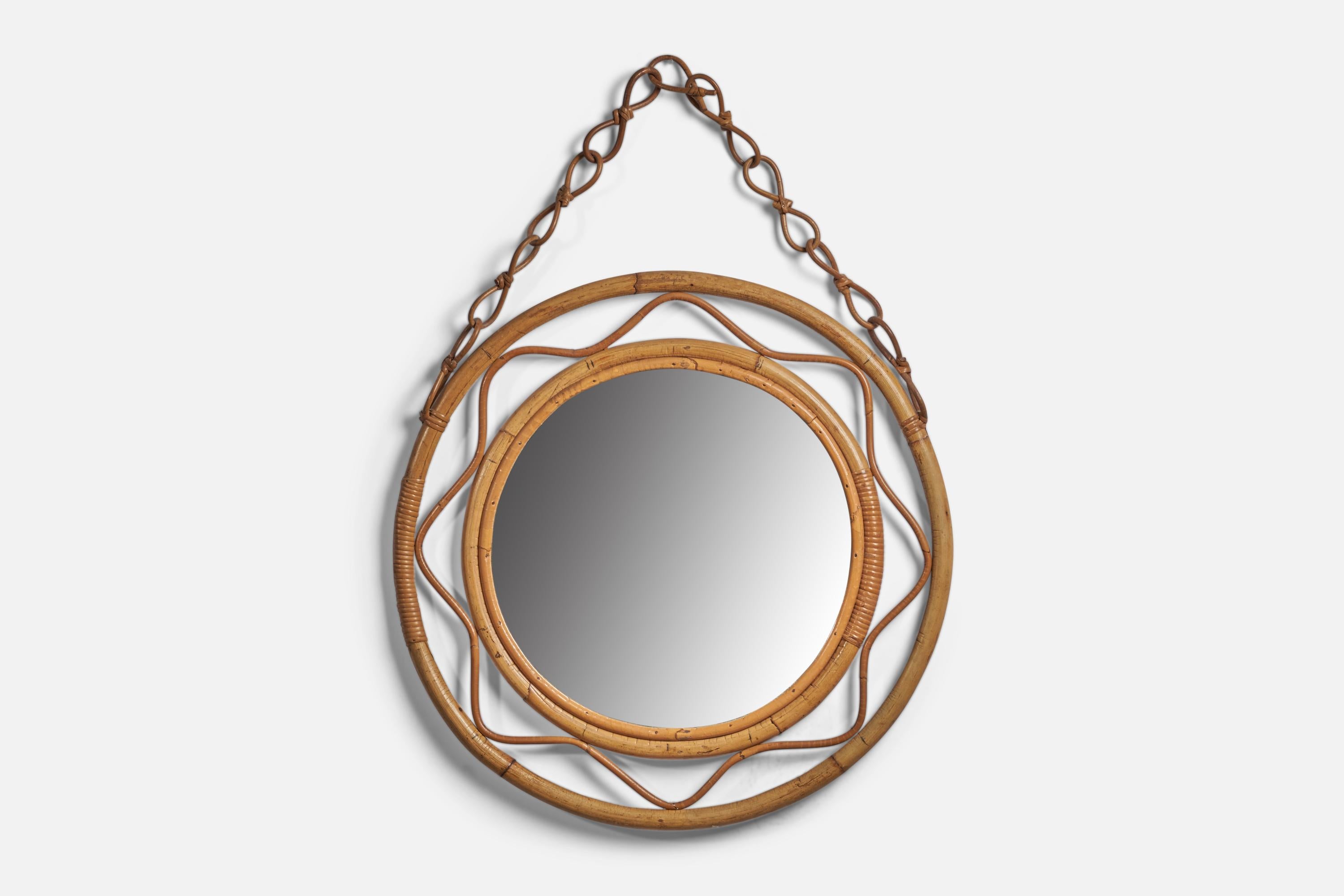 A rattan and bamboo wall mirror, designed and produced in Italy, 1950s

Chain adds 9