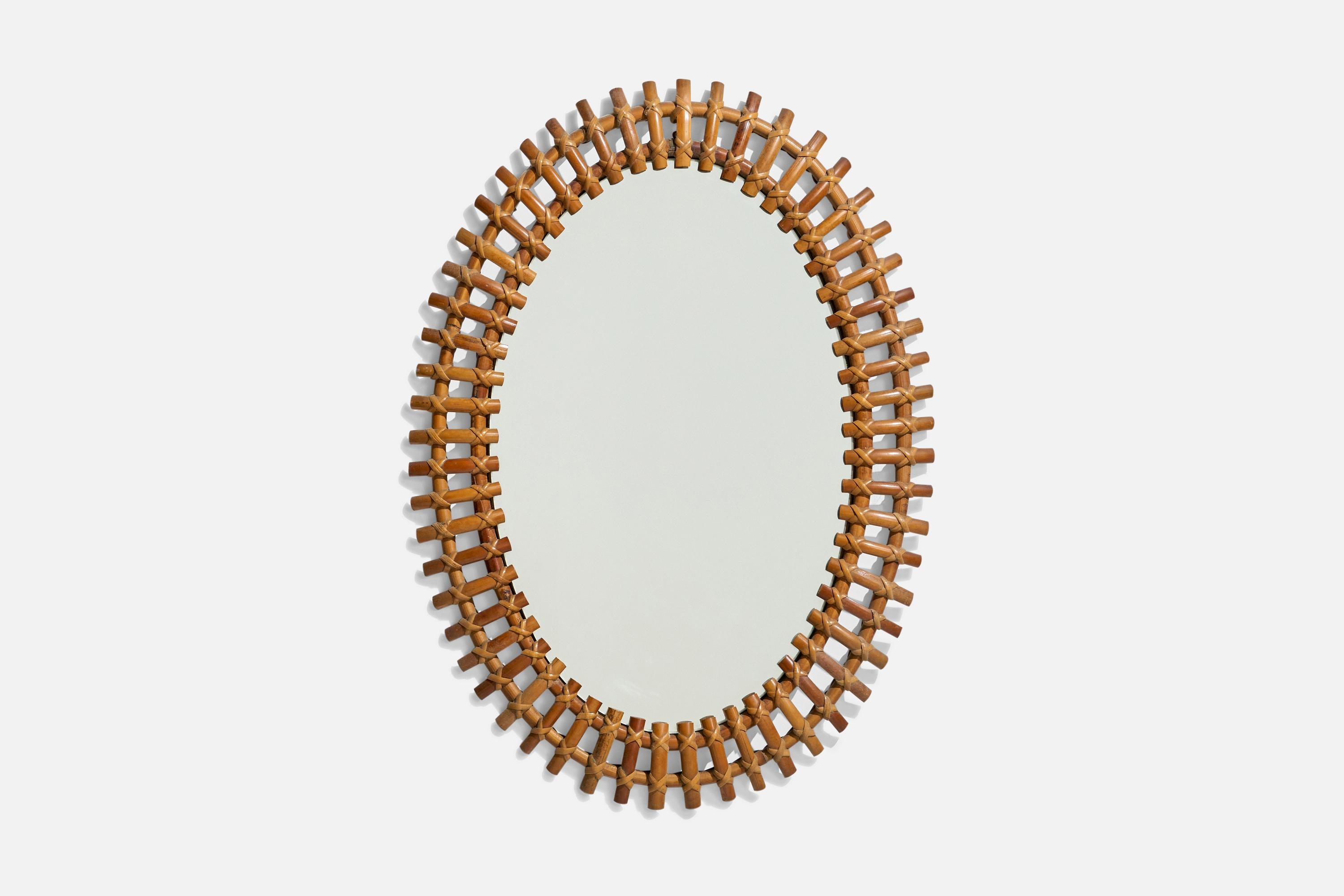 Specchio da parete in bambù e rattan prodotto in Italia, anni '50. 
 