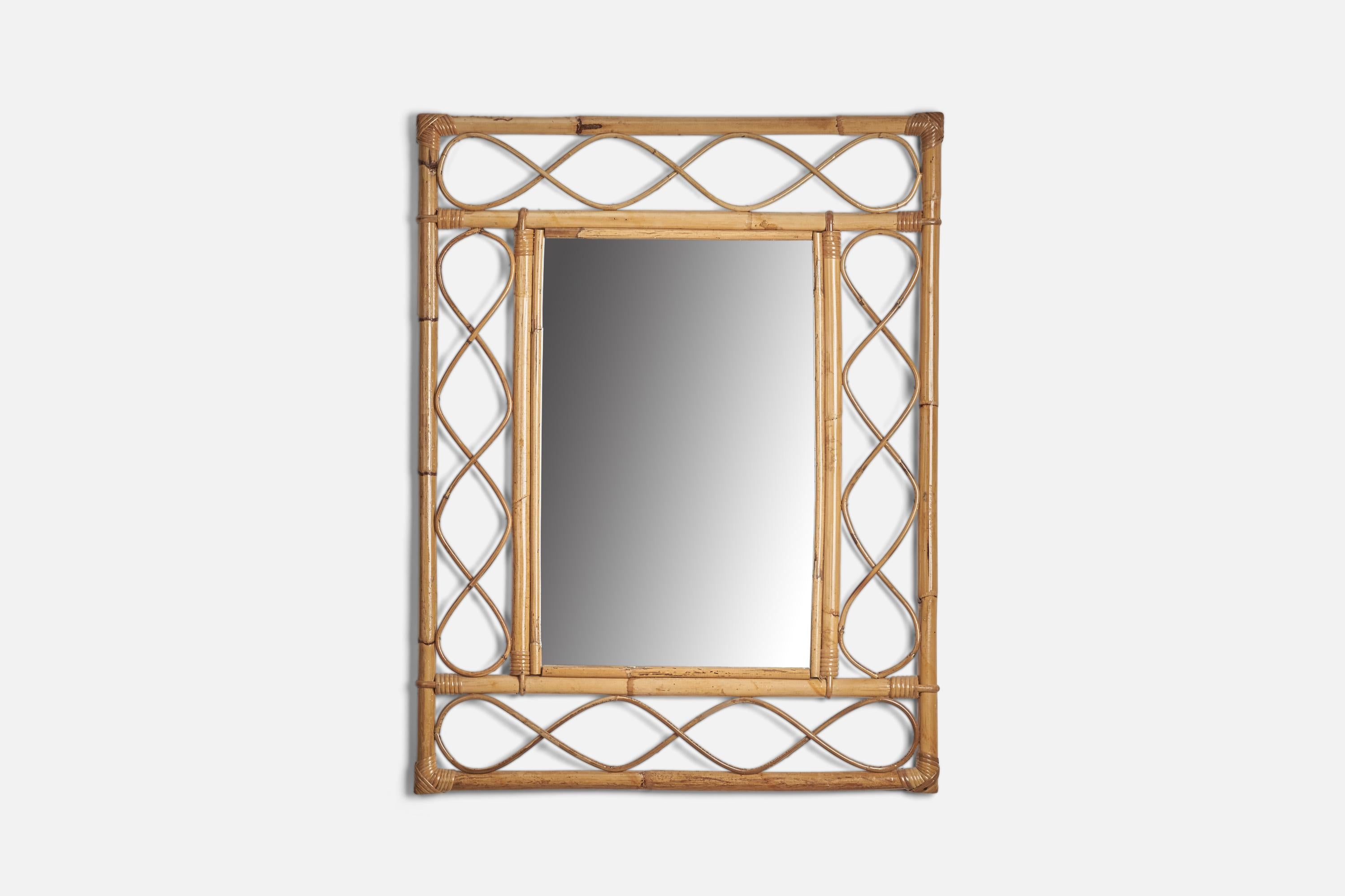 A rattan, bamboo wall mirror designed and produced by an Italian Designer, Italy, 1960s.