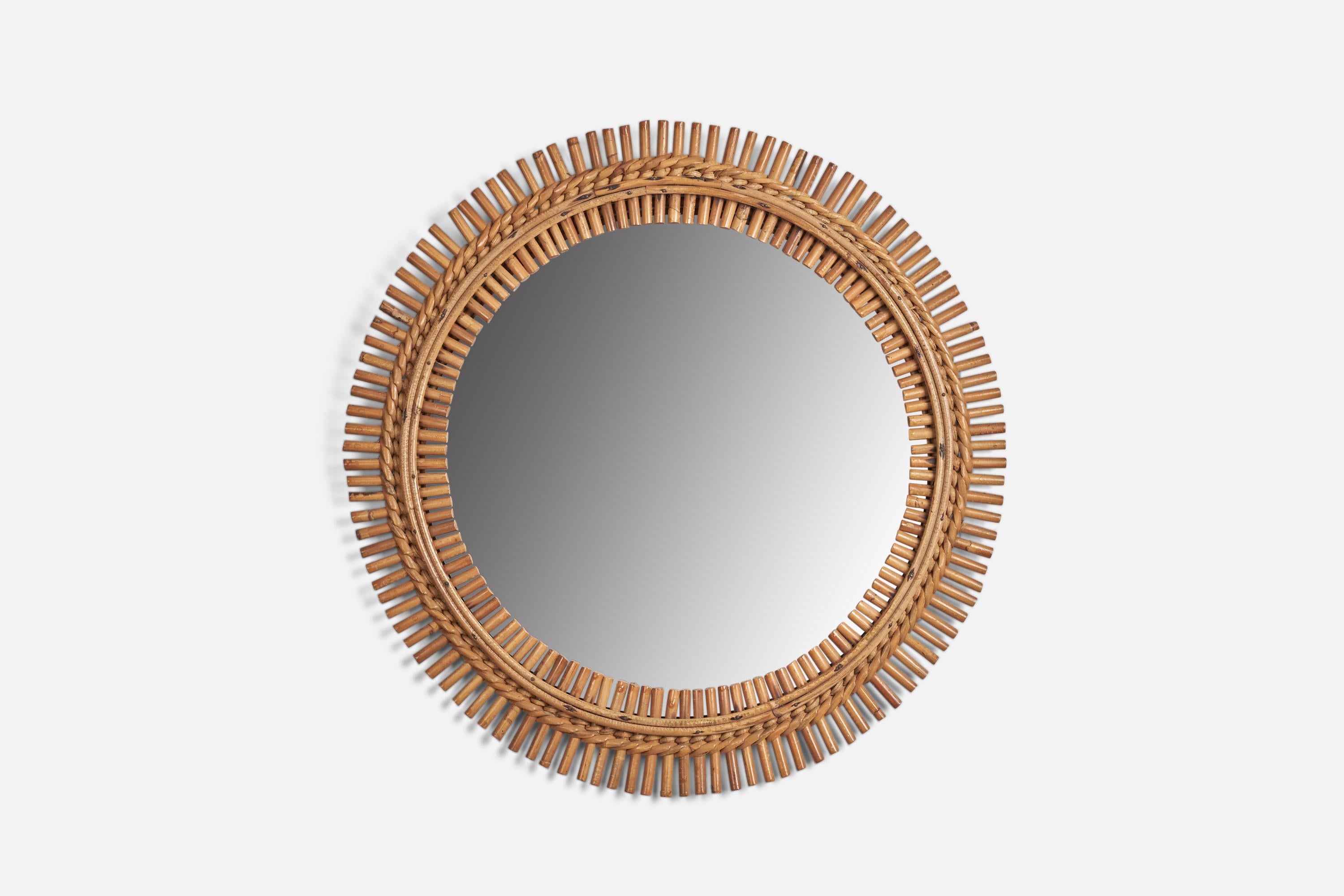 A rattan, bamboo wall mirror designed and produced by an Italian Designer, Italy, 1960s.