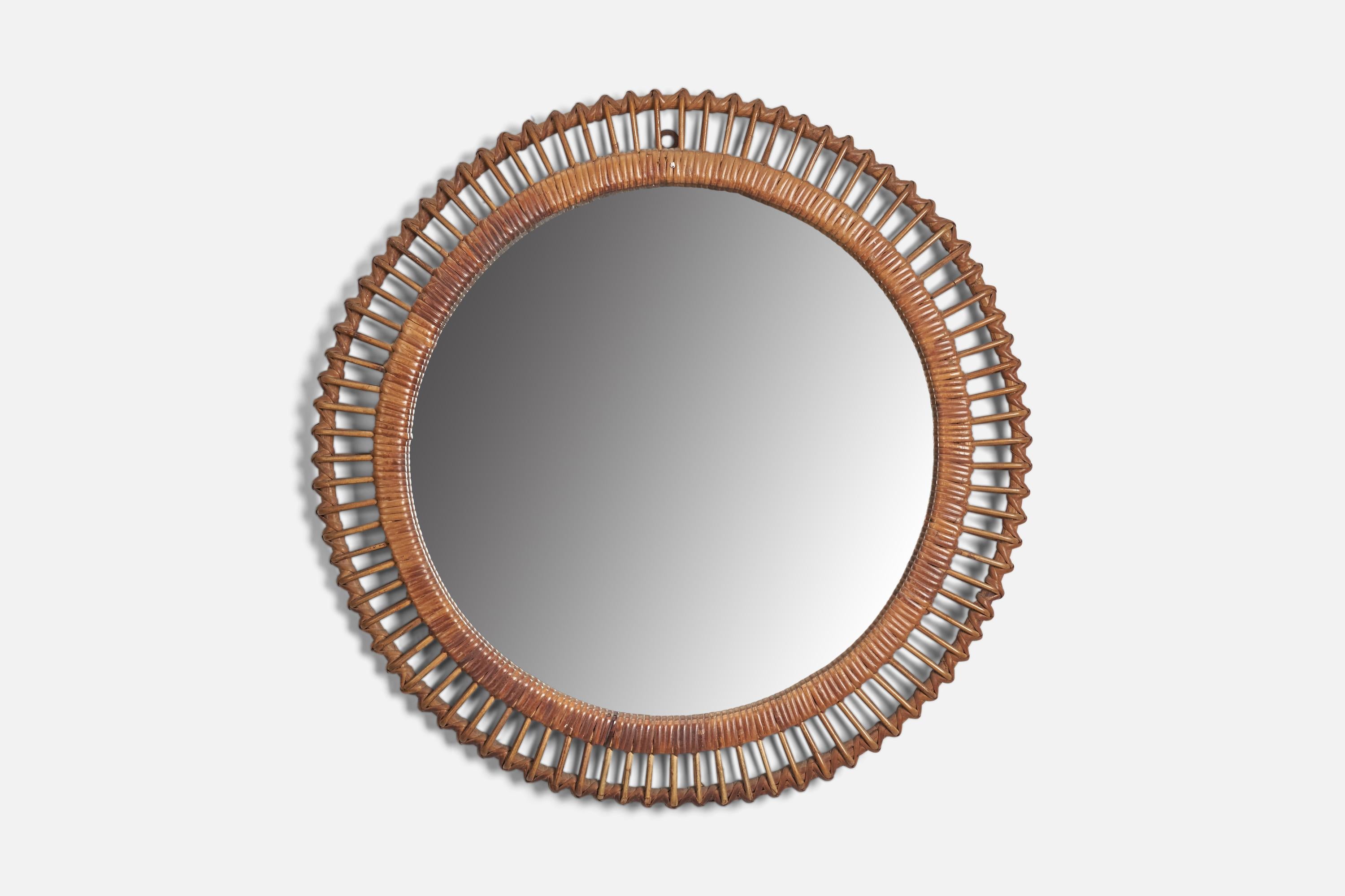 A rattan and bamboo wall mirror designed and produced by an Italian Designer, Italy, 1960s.