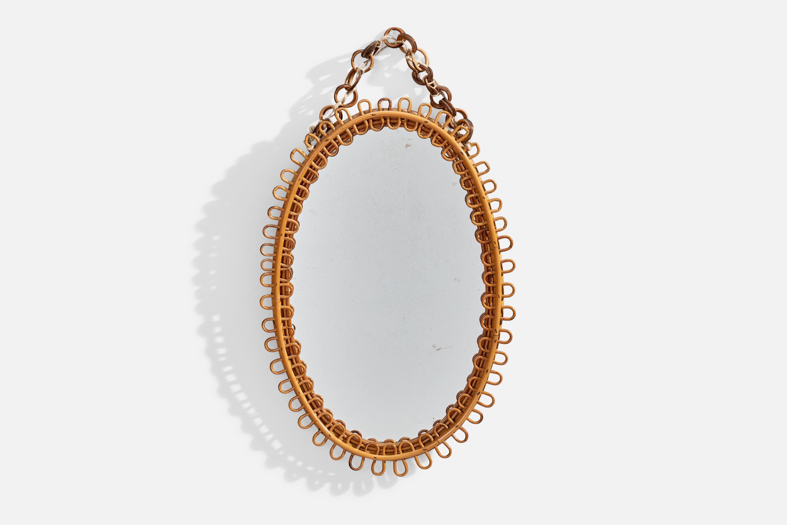 Specchio da parete in rattan e bambù disegnato e prodotto in Italia, anni '1960.
