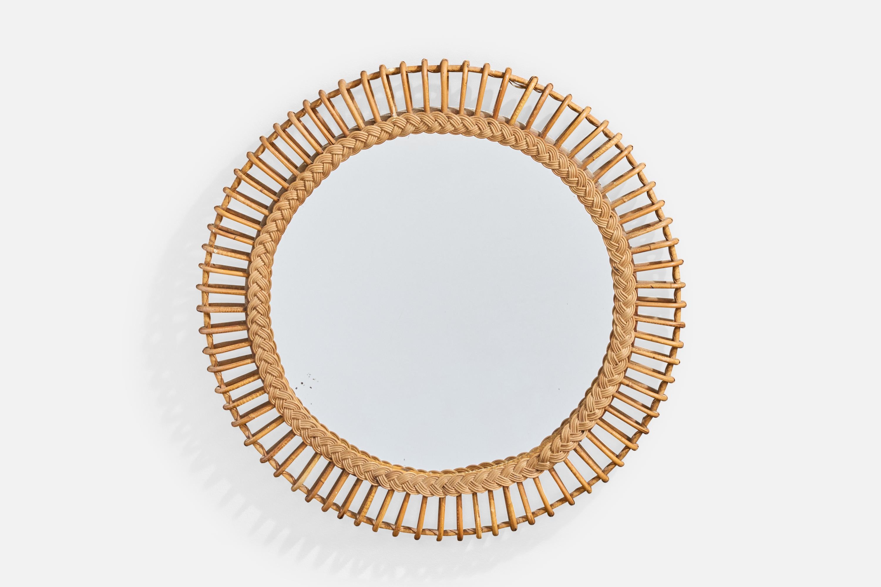 Specchio da parete in bambù e rattan progettato e prodotto in Italia, anni '60 circa.

Dimensioni complessive (pollici): 23,75 