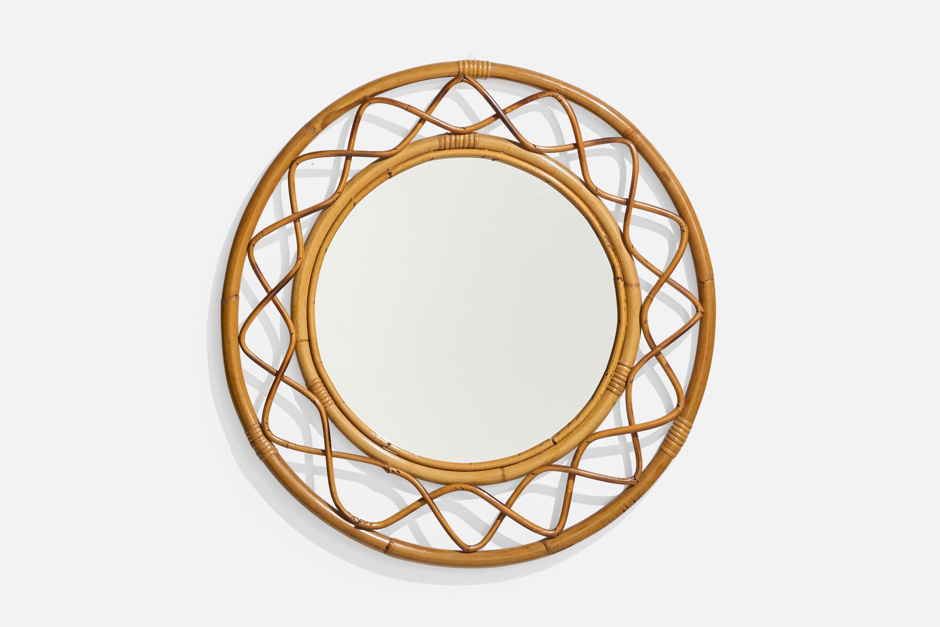 A bamboo and rattan wall mirror designed and produced by an Italian designer, Italy, 1950s-1960s.
 