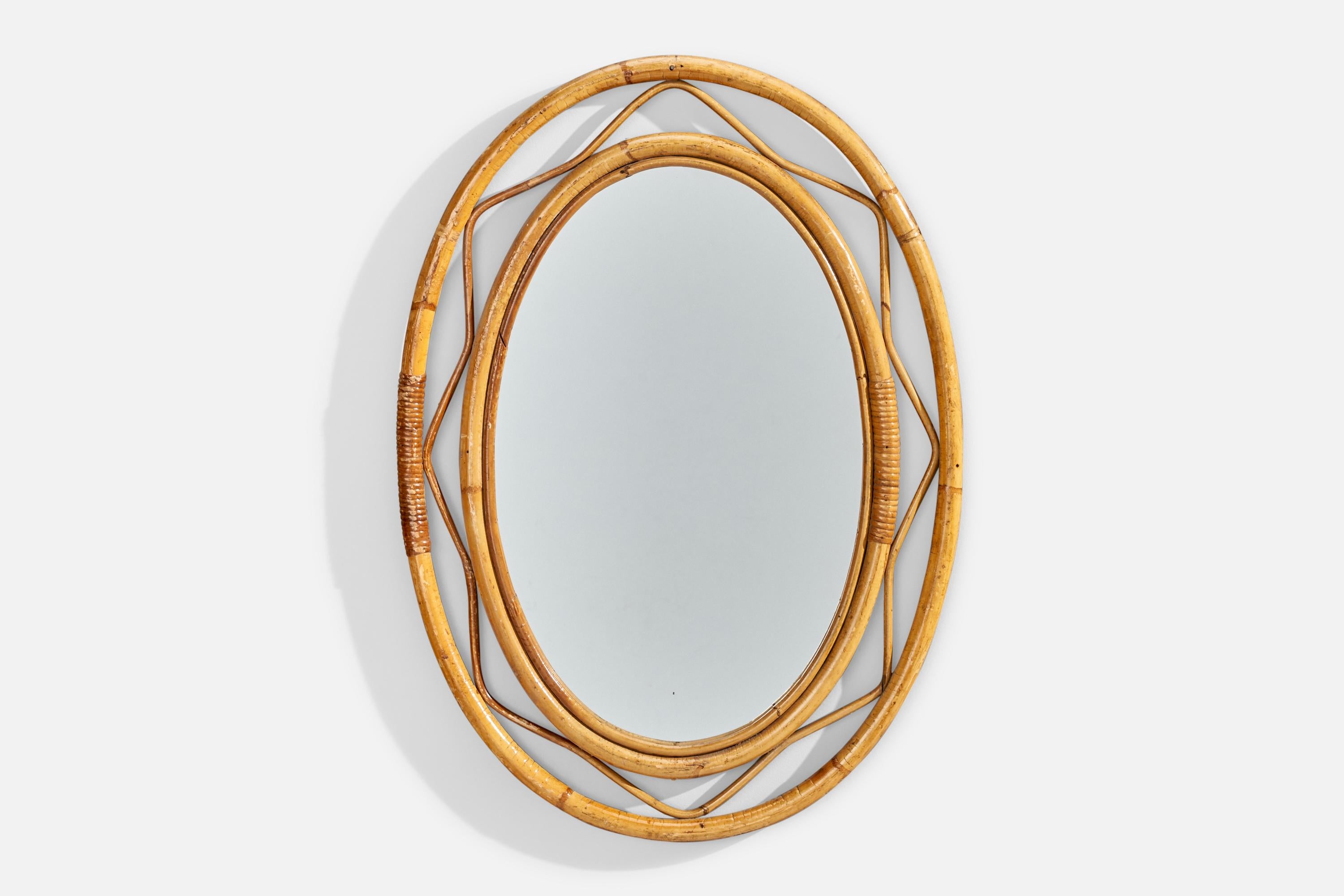 Miroir mural en rotin et bambou conçu et produit par un designer italien, Italie, c. 1960s.
   