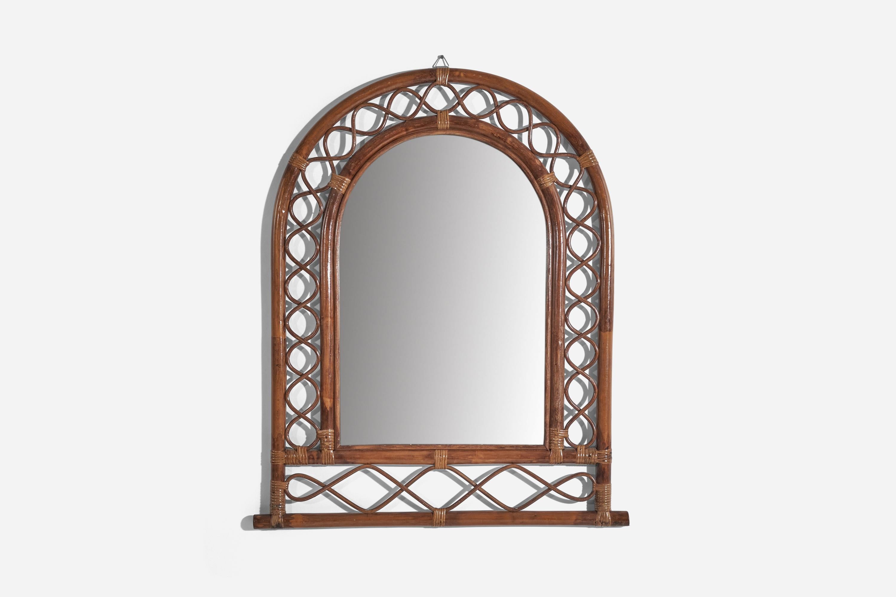 A rattan and bamboo wall mirror designed and produced by an Italian designer, Italy, 1950s-1960s.
    