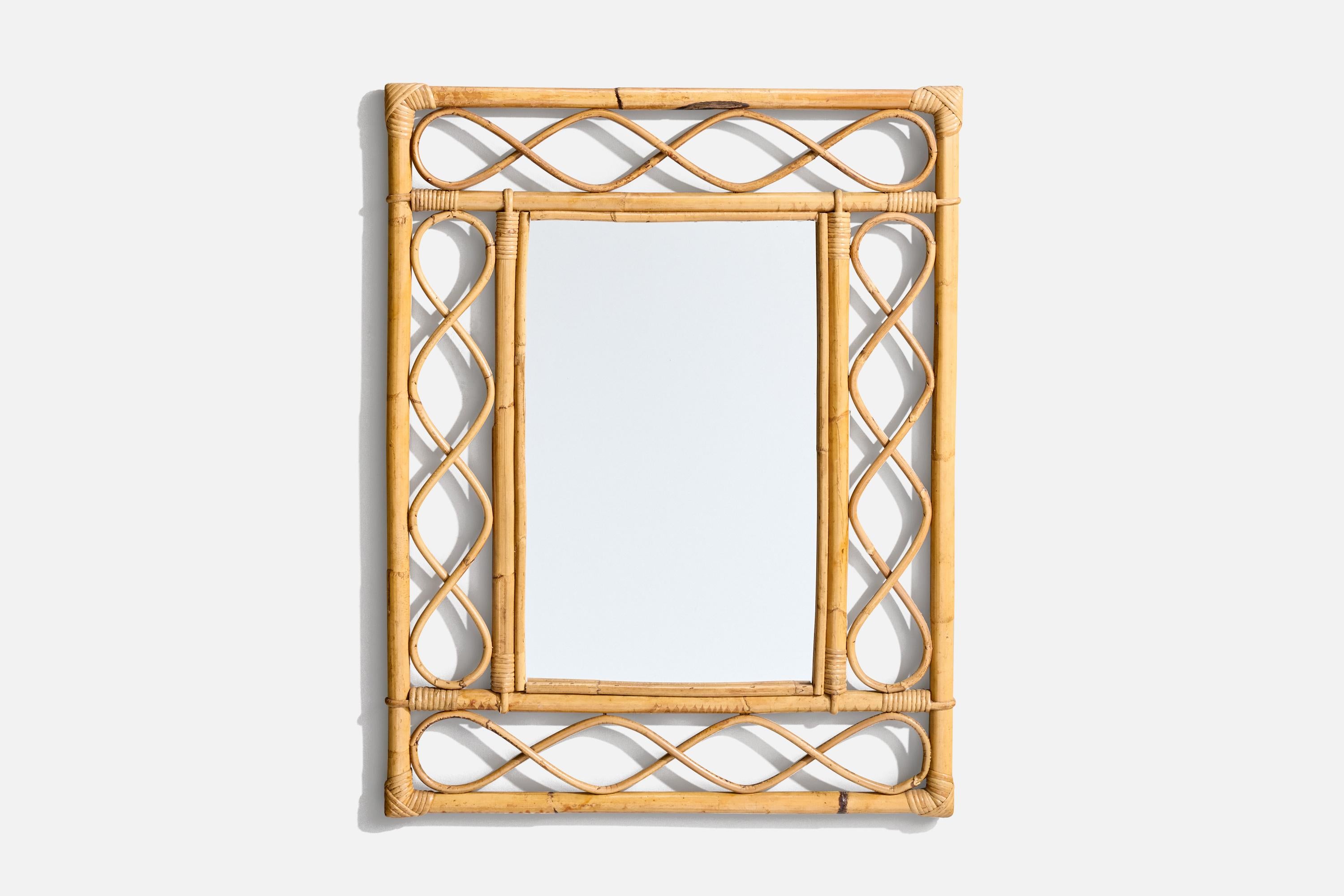 Miroir mural en rotin et bambou conçu et réalisé par un designer italien, Italie, années 1950-1960.
 
