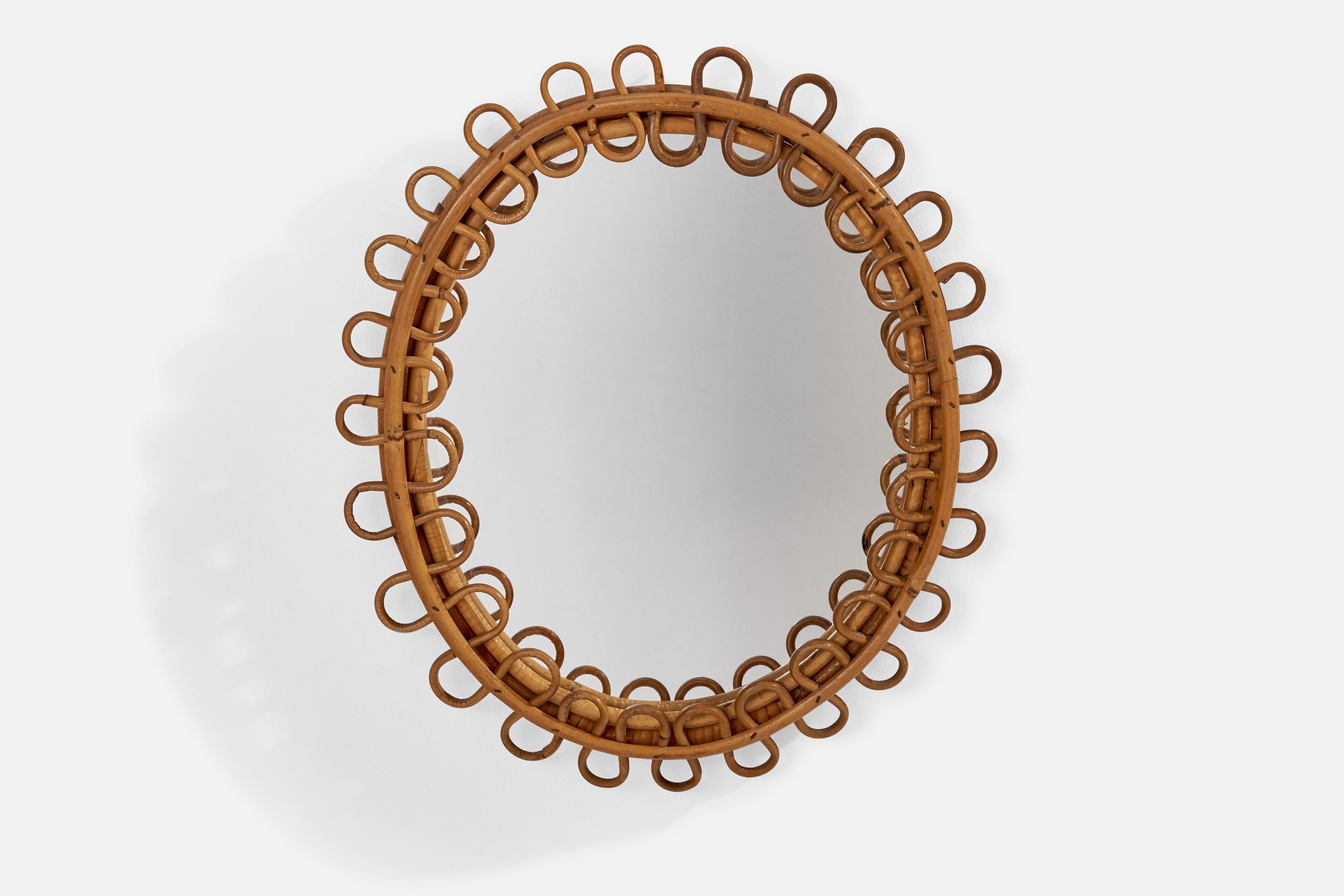 Ein Wandspiegel aus Rattan, entworfen und hergestellt von einem italienischen Designer, Italien, 1960er Jahre.