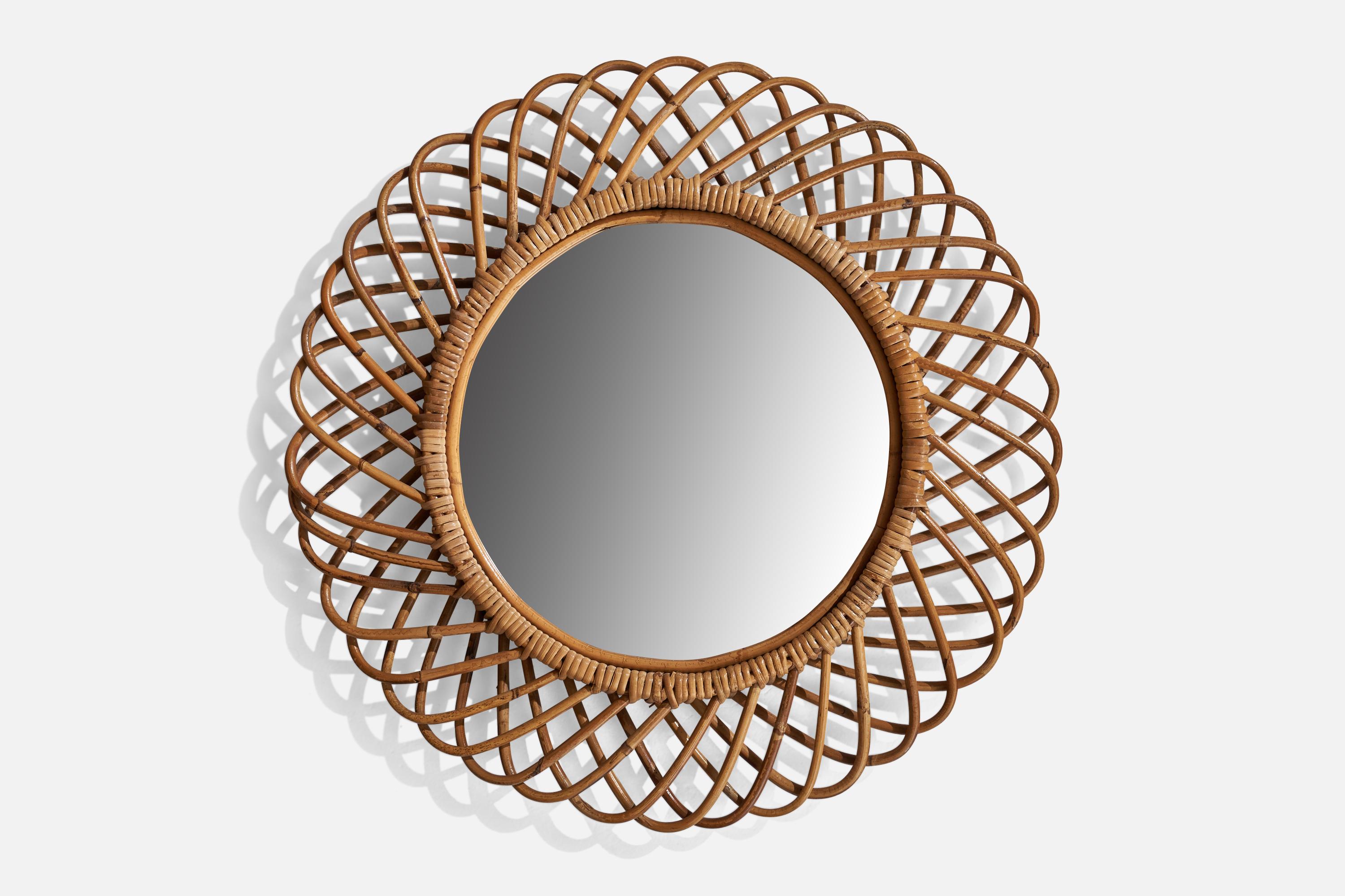 A rattan wall mirror designed and produced in Italy, 1960s.