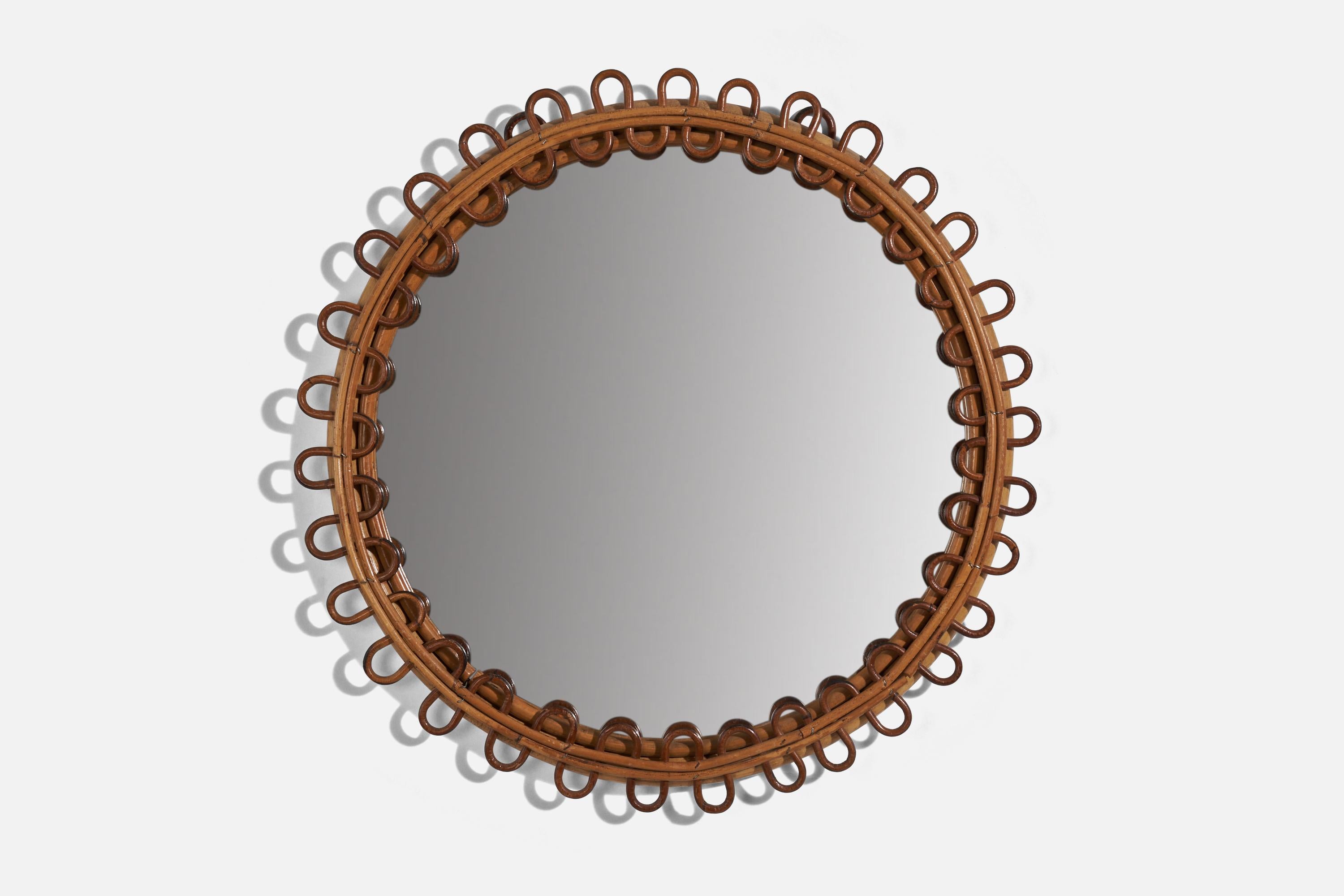 A bamboo and rattan wall mirror designed and produced in Italy, 1950s. 