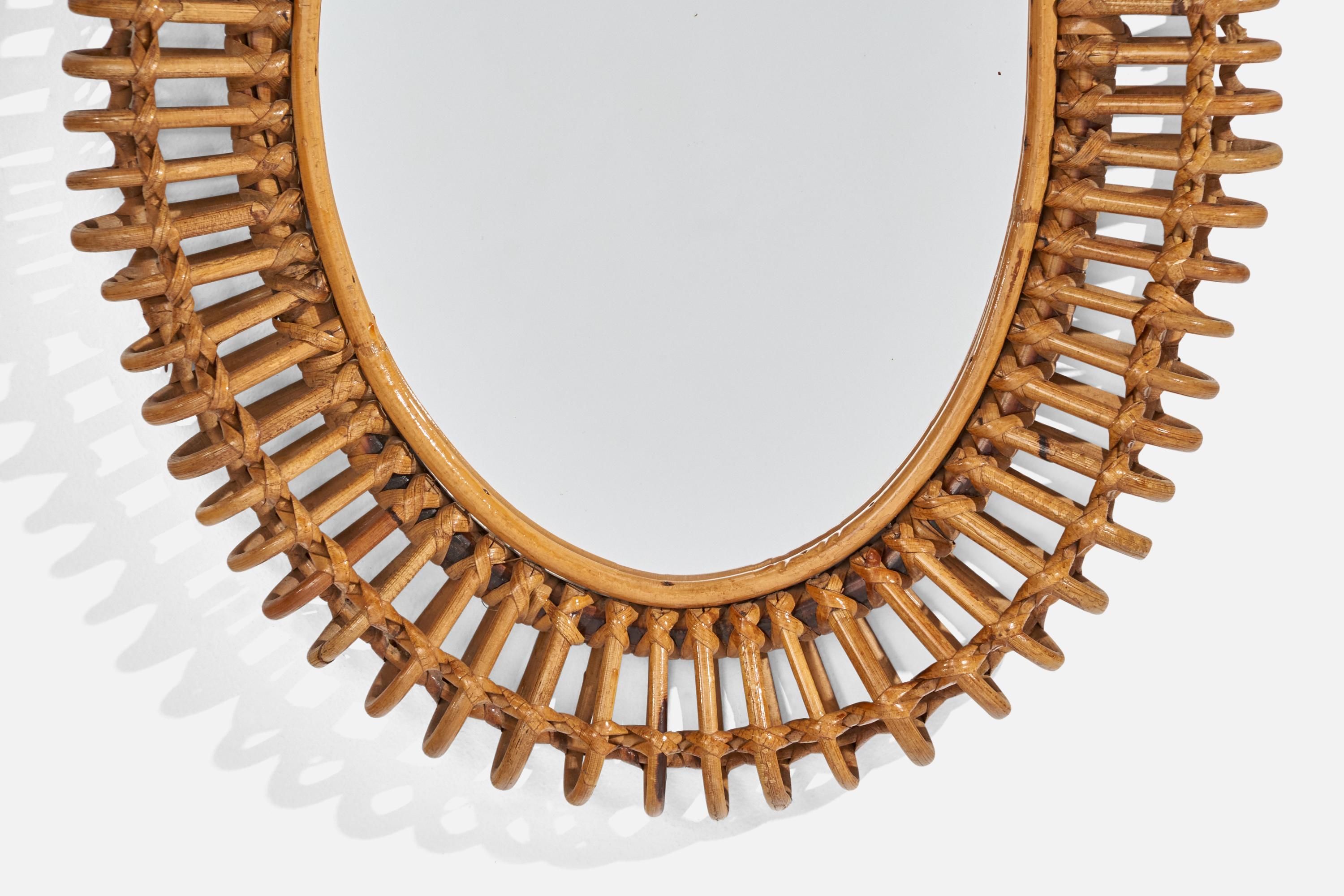 Diseñador italiano, espejo de pared, ratán, espejo de cristal, Italia, años 1950 en Bueno estado para la venta en High Point, NC