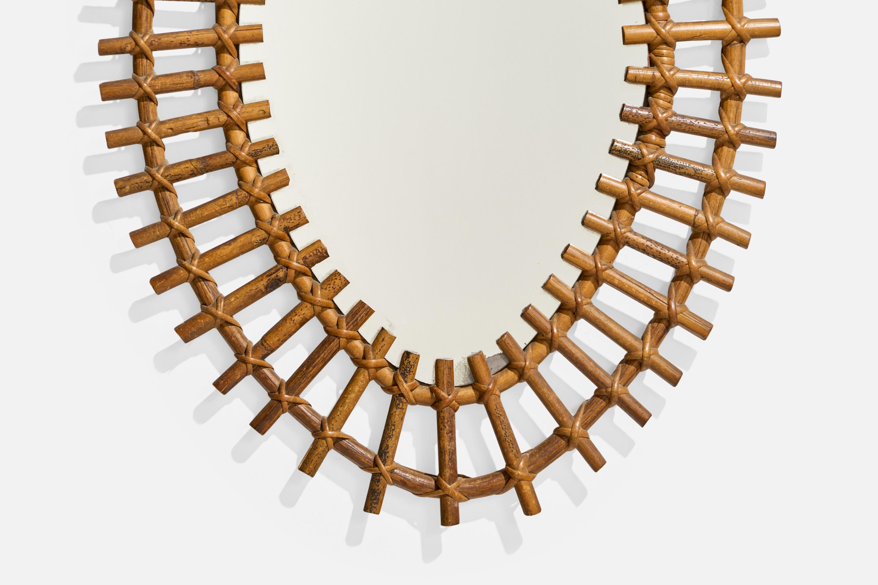 Designer italien, miroir mural, rotin, verre miroir, Italie, vers les années 1950 en vente 1