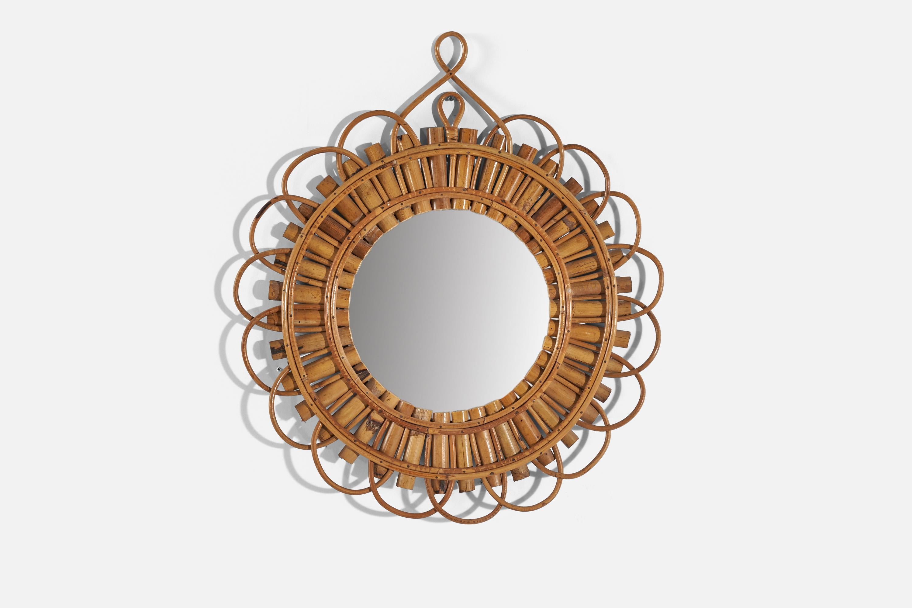 A rattan wall mirror designed and produced by an Italian designer, Italy, 1950s-1960s.
   