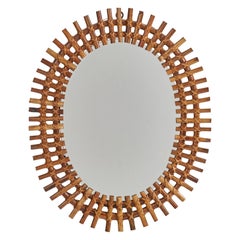Italienischer italienischer Designer, ovaler Wandspiegel, Rattan, Spiegel, Italien, ca. 1950er Jahre