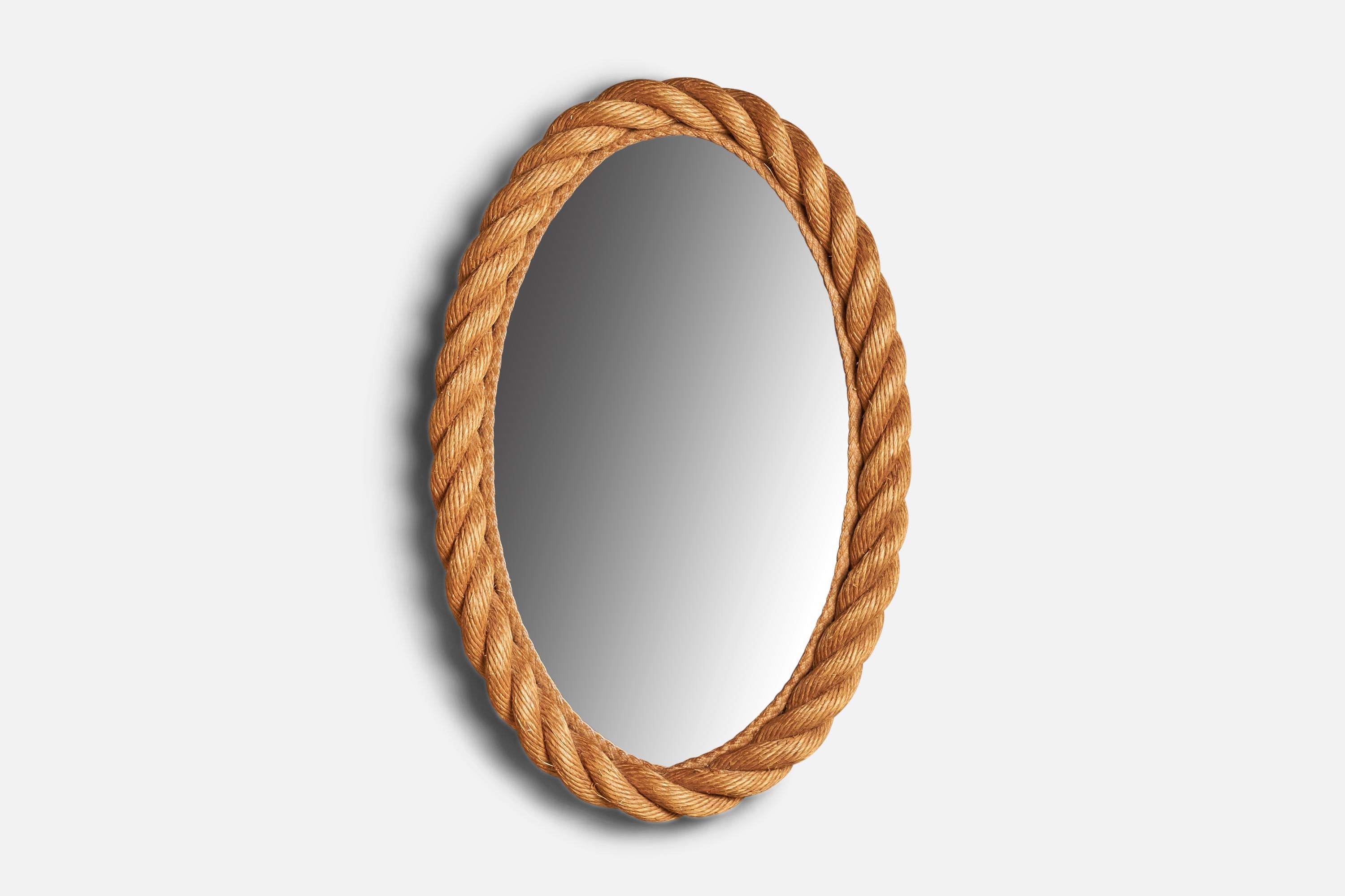 A rope wall mirror designed and produced in Italy, 1960s.