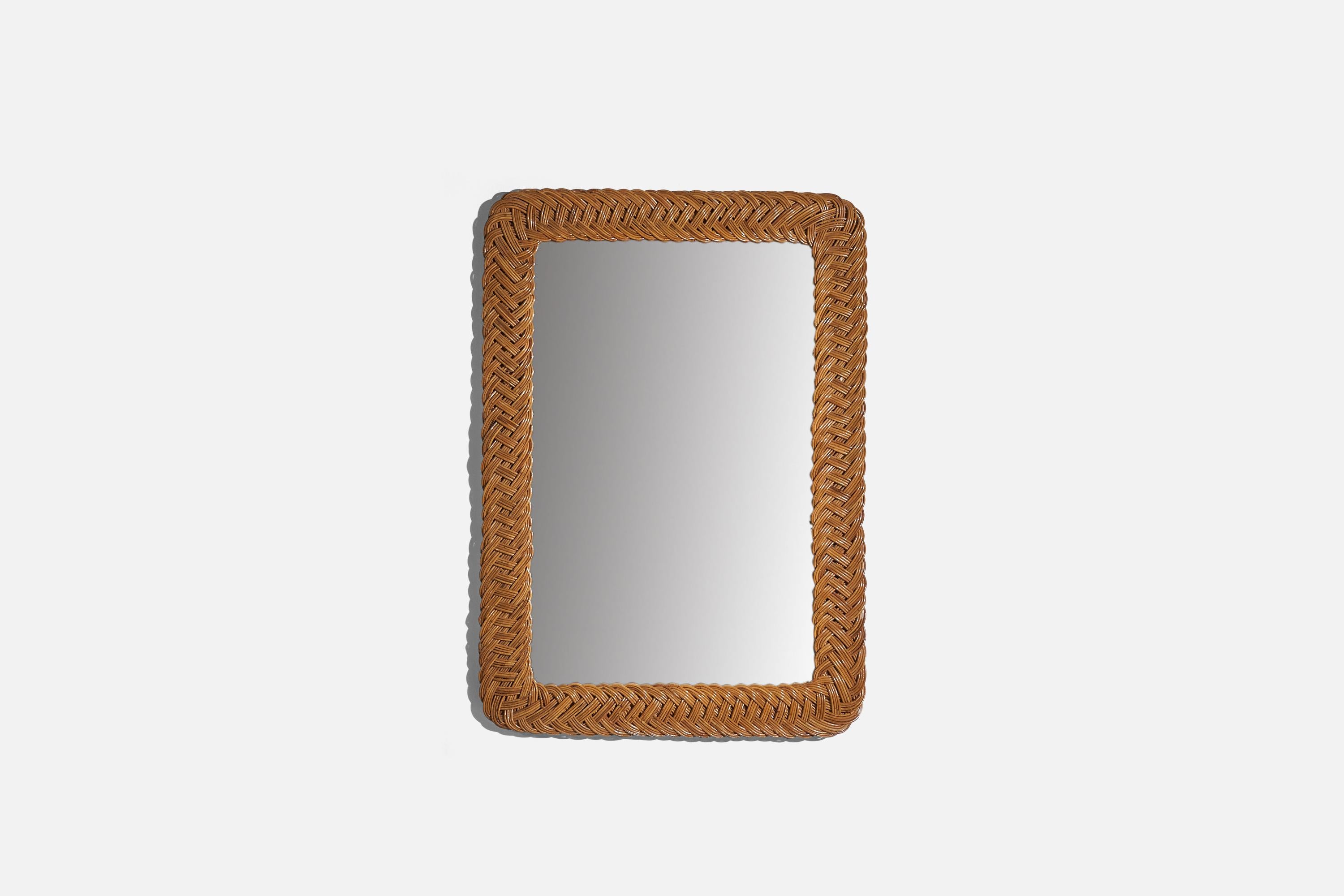 A wicker wall mirror designed and produced by an Italian designer, Italy, 1950s-1960s.
 