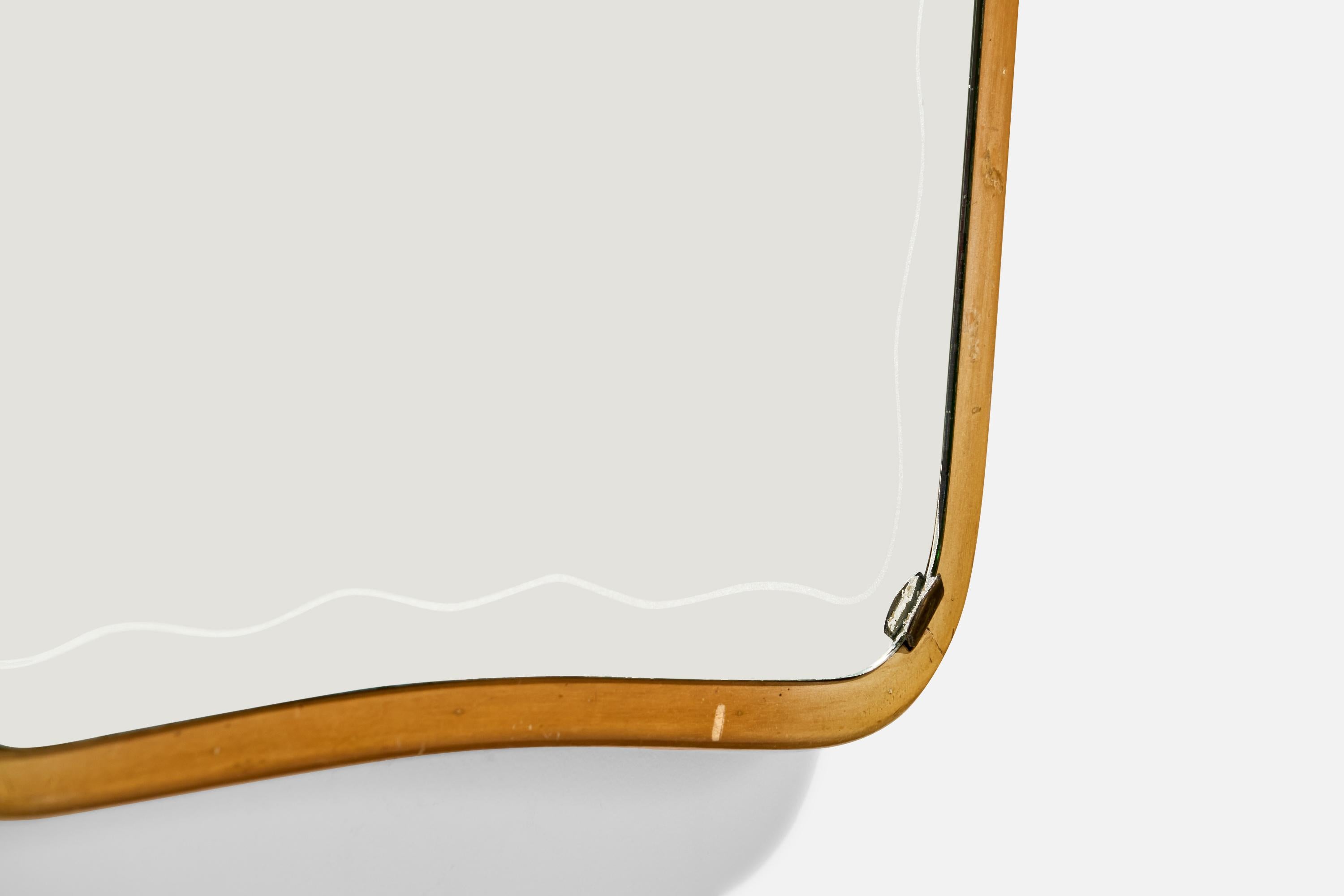 A sizable wood, brass, and etched mirror glass wall mirror designed and produced in Italy, c. 1940s.

Light scratching and oxidation present to mirror. 

Dimensions: 45” H x 24” W x 1.4” D
