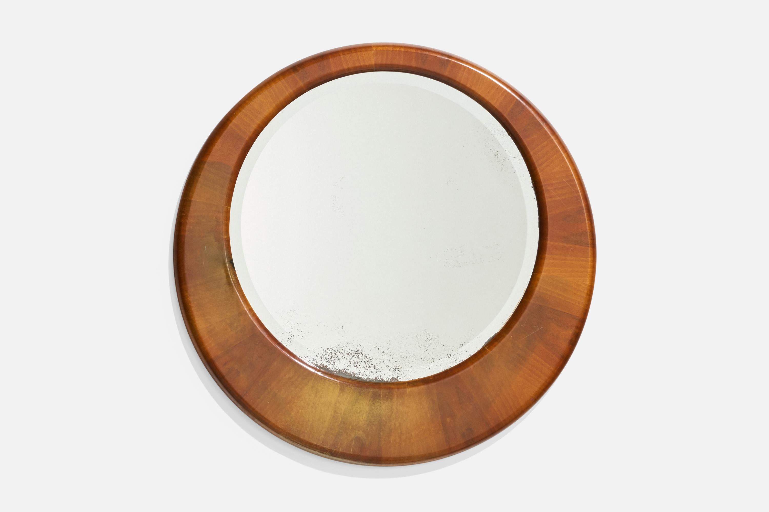 Specchio da parete in legno progettato e prodotto in Italia, anni '1940.
 