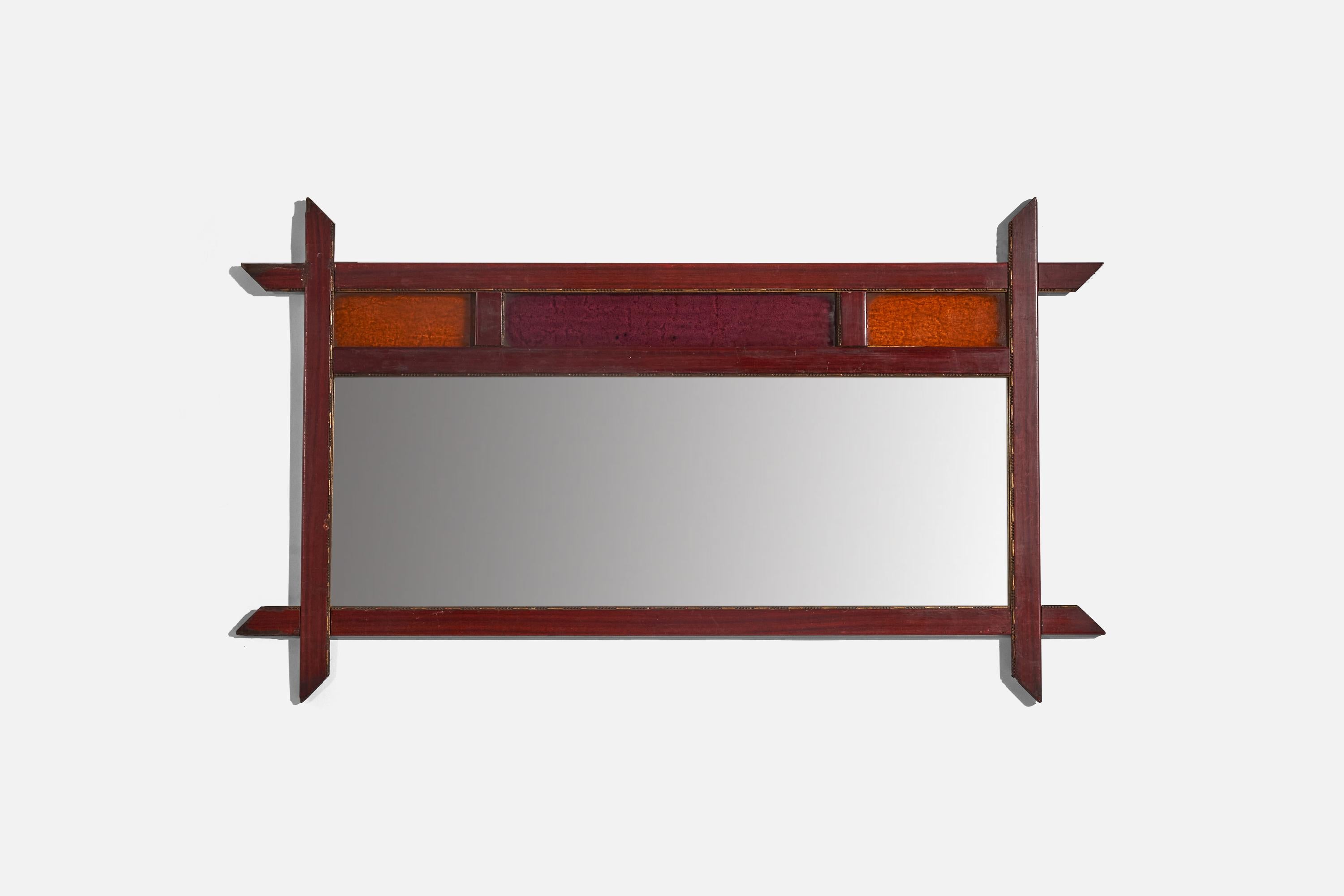 A wood and glass wall mirror designed and produced by an Italian designer, Italy, c. 1960s.
 