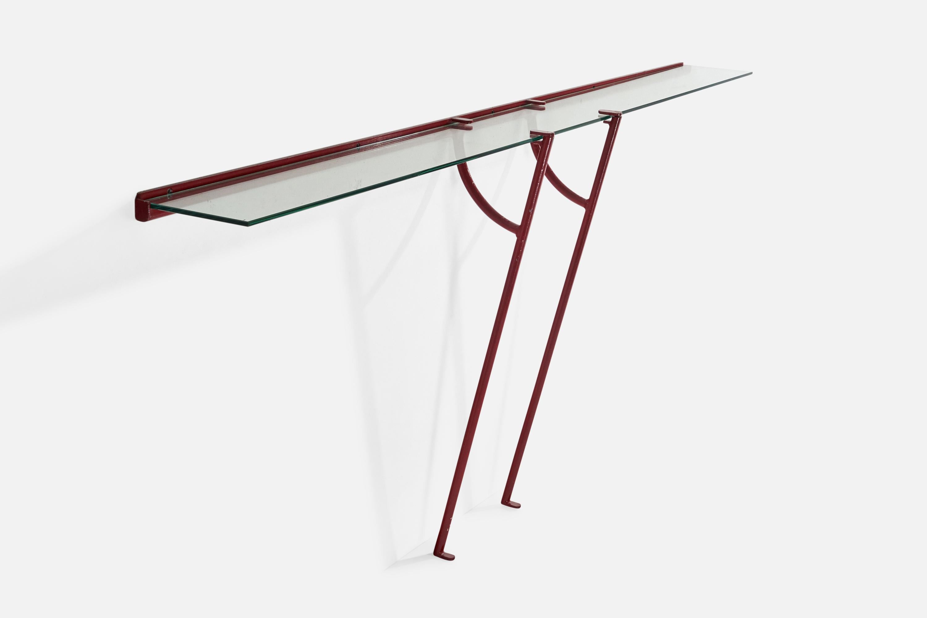 A red-lacquered metal and glass wall mounted console table designed and produced in Italy, c. 1960s.