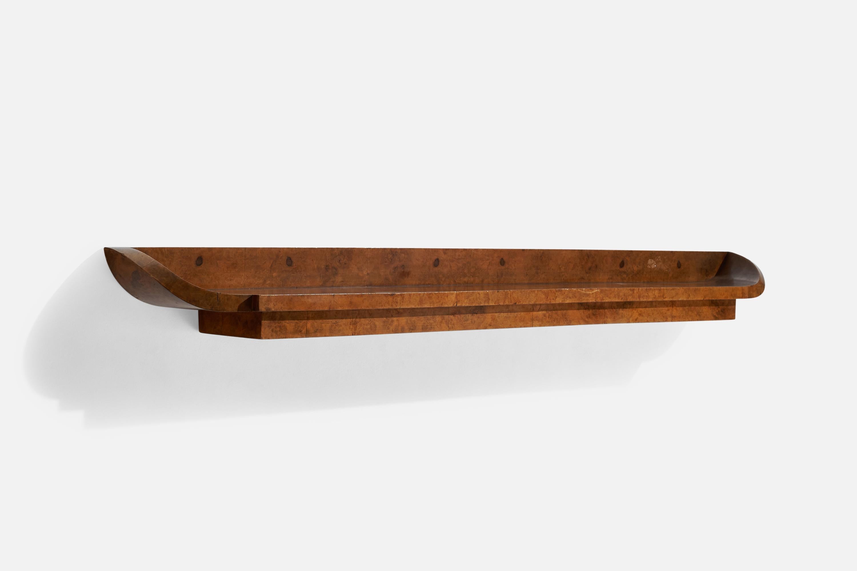 A sizeable burl wood shelf or console designed and produced in Italy, 1930s.